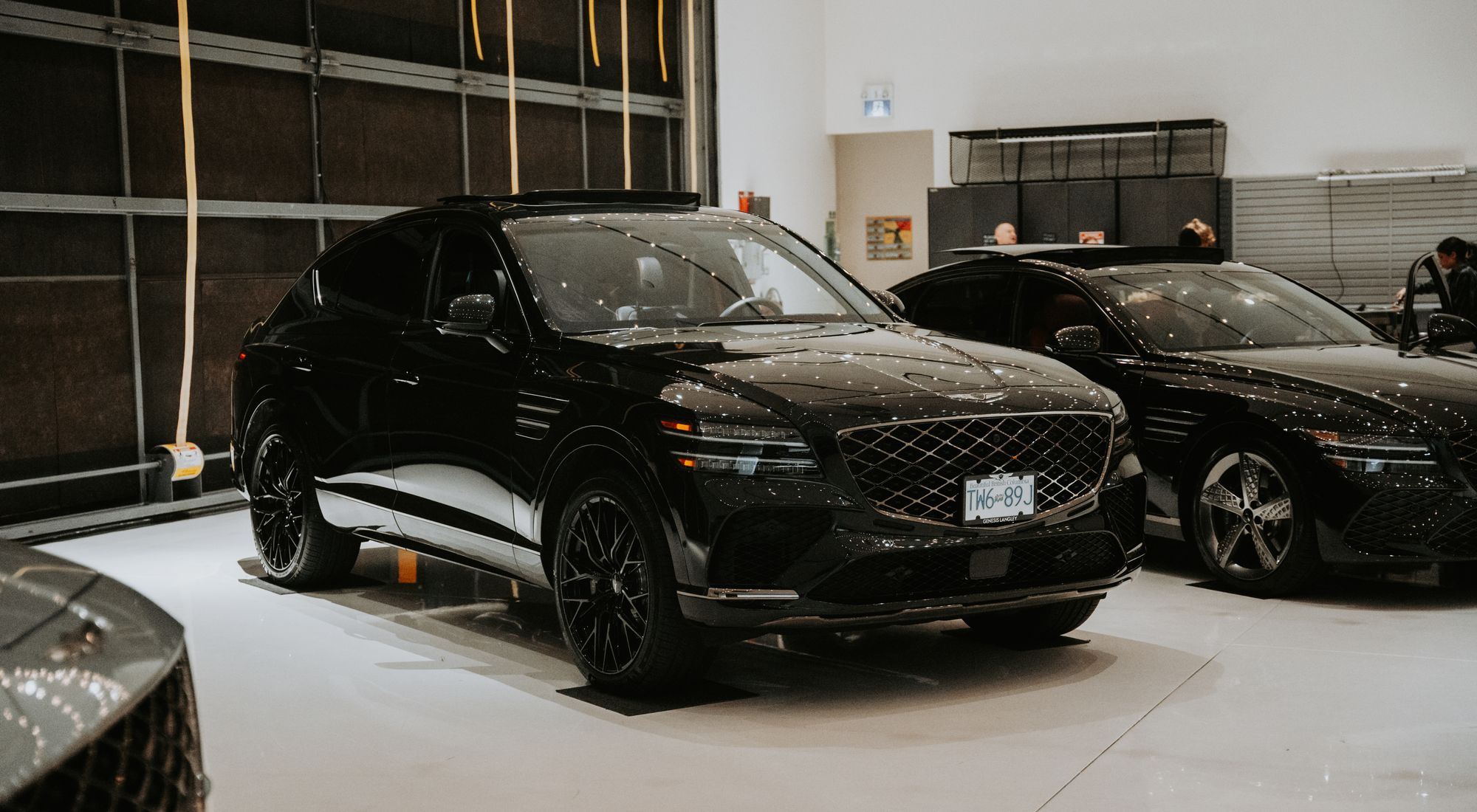 Premium luxury car showroom interior with polished reflections
