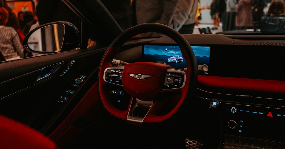 Luxury Car Interior with Elegant Red Upholstery · Free Stock Photo