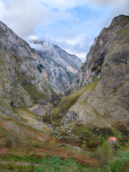 Discover the serene landscape of Bulnes, Spain in the rugged Picos de Europa mountains, perfect for nature enthusiasts.