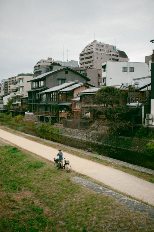 Free Charming Kyoto street by the river, with traditional Japanese houses. Quiet pathway scene. Stock Photo
