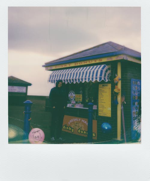 Person Standing Near Store