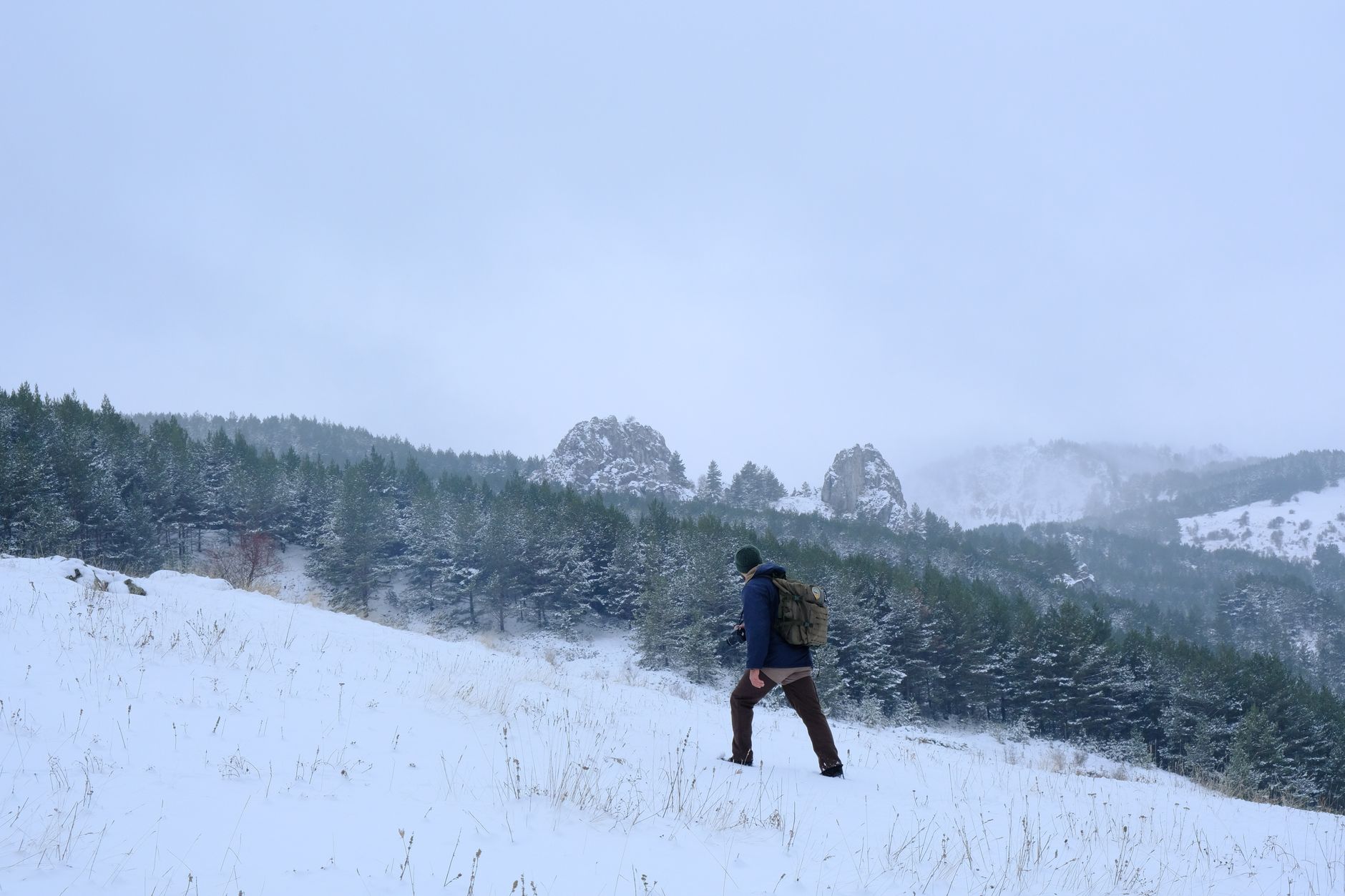 hiker walking mountain wilderness