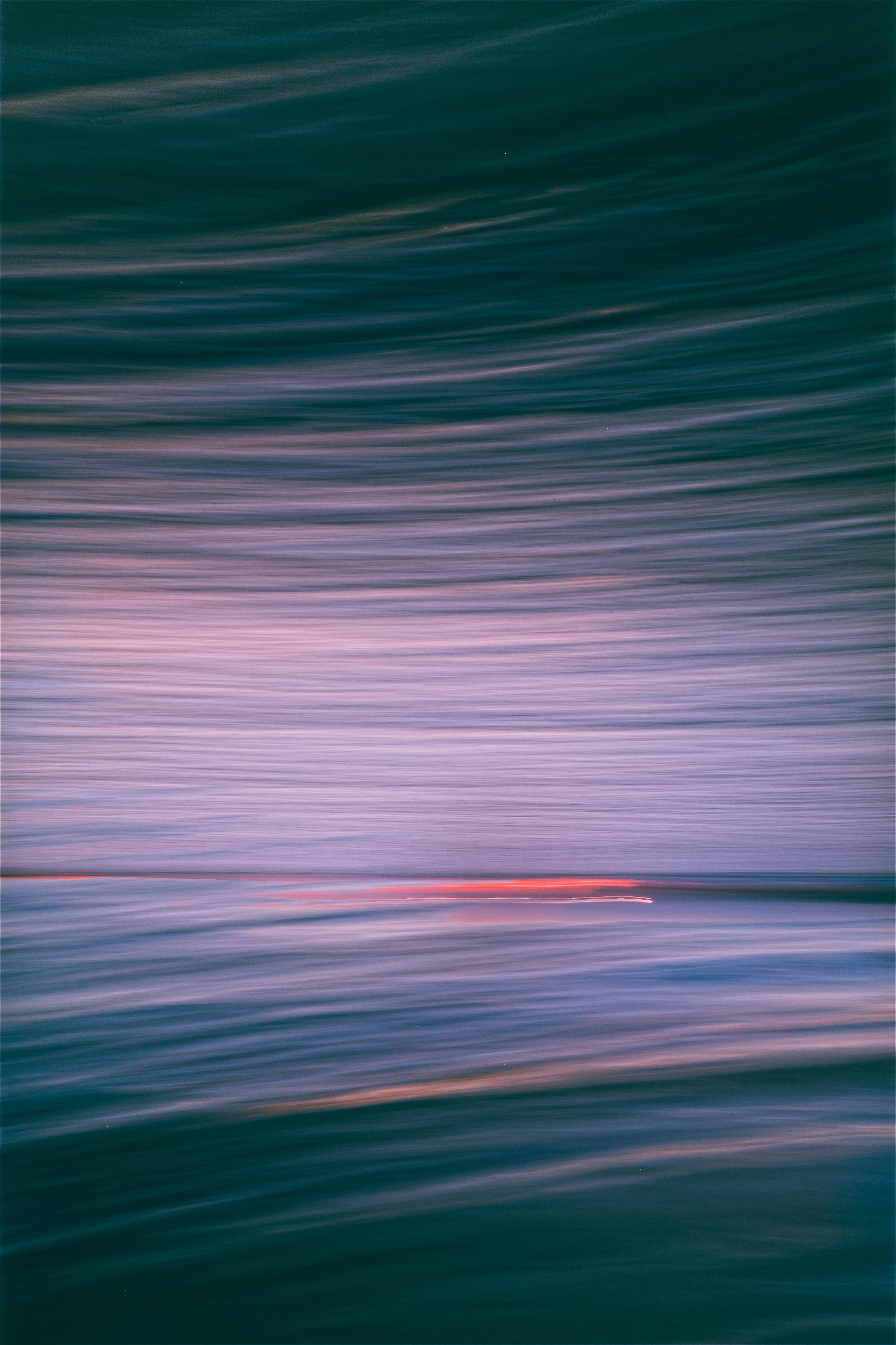 Captivating abstract image featuring dynamic flow and gradient fade with pink and purple hues.
