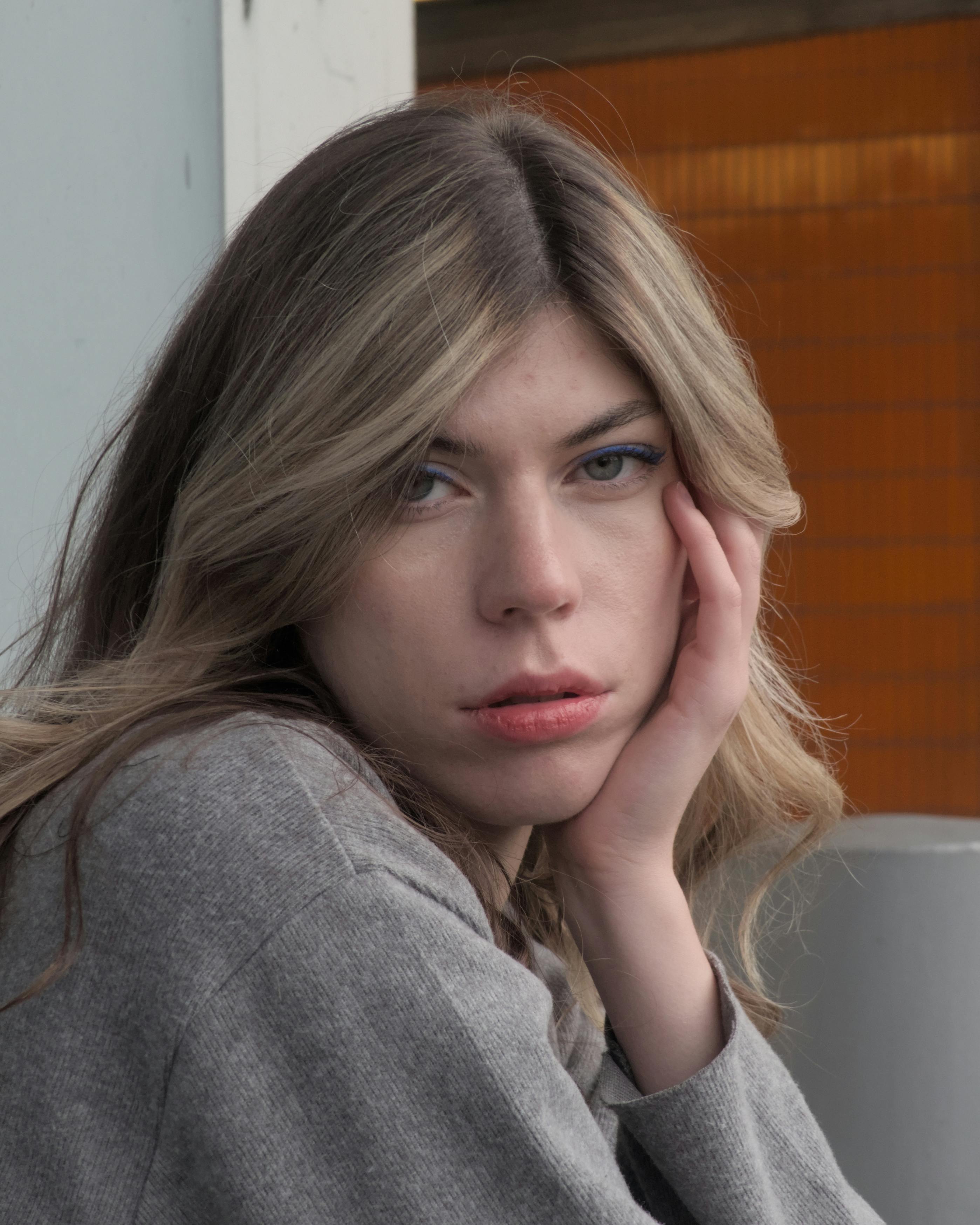 portrait of a thoughtful woman outdoors