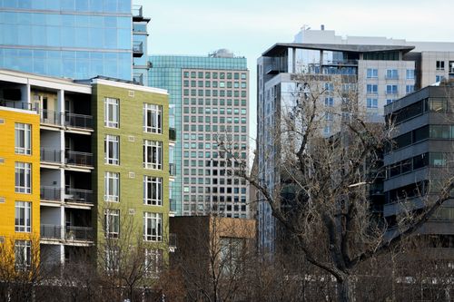 Free Vibrant cityscape featuring colorful apartment buildings and modern architecture. Stock Photo
