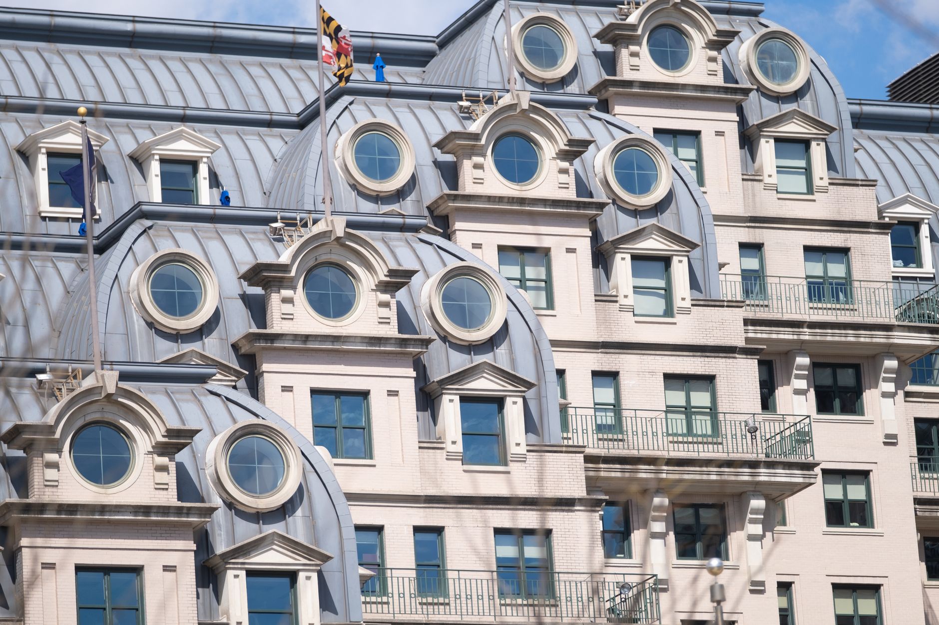Close-up of a modern building with distinctive circular windows in Washington DC.