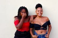 Smiling Friends in Colorful Summer Outfits