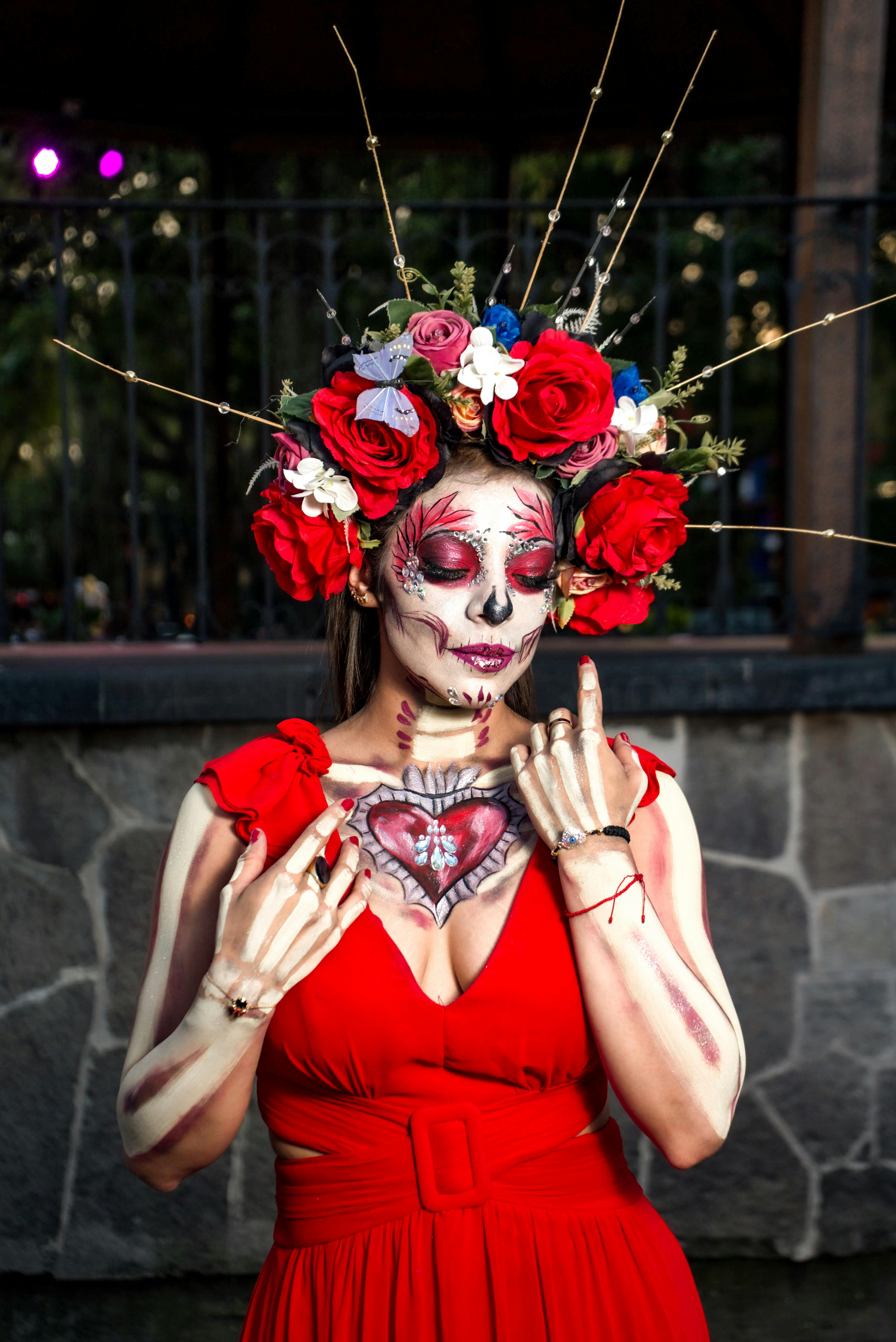 colorful day of the dead makeup portrait outdoors