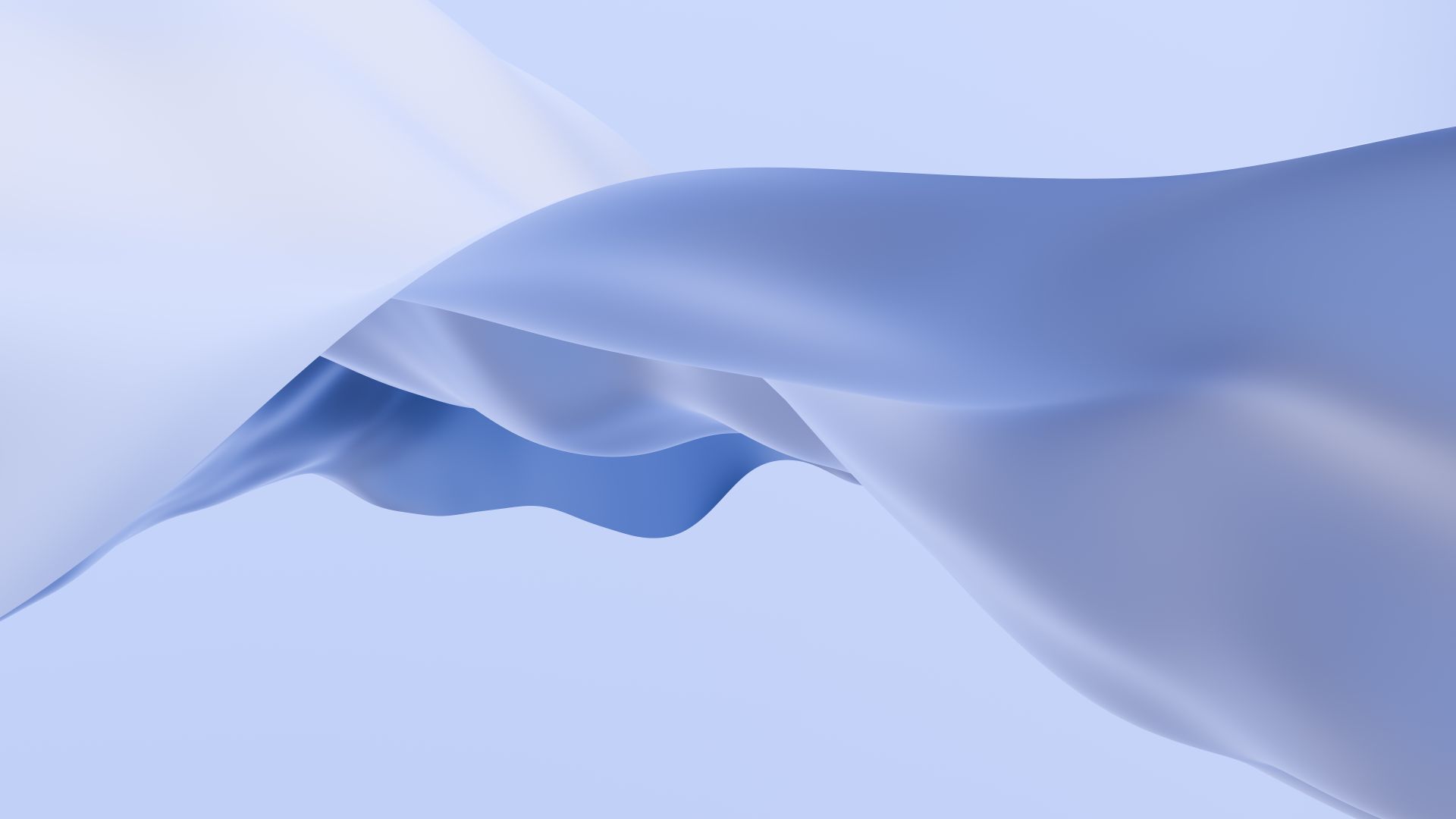 Smooth flowing blue fabric creating an abstract and tranquil visual experience.