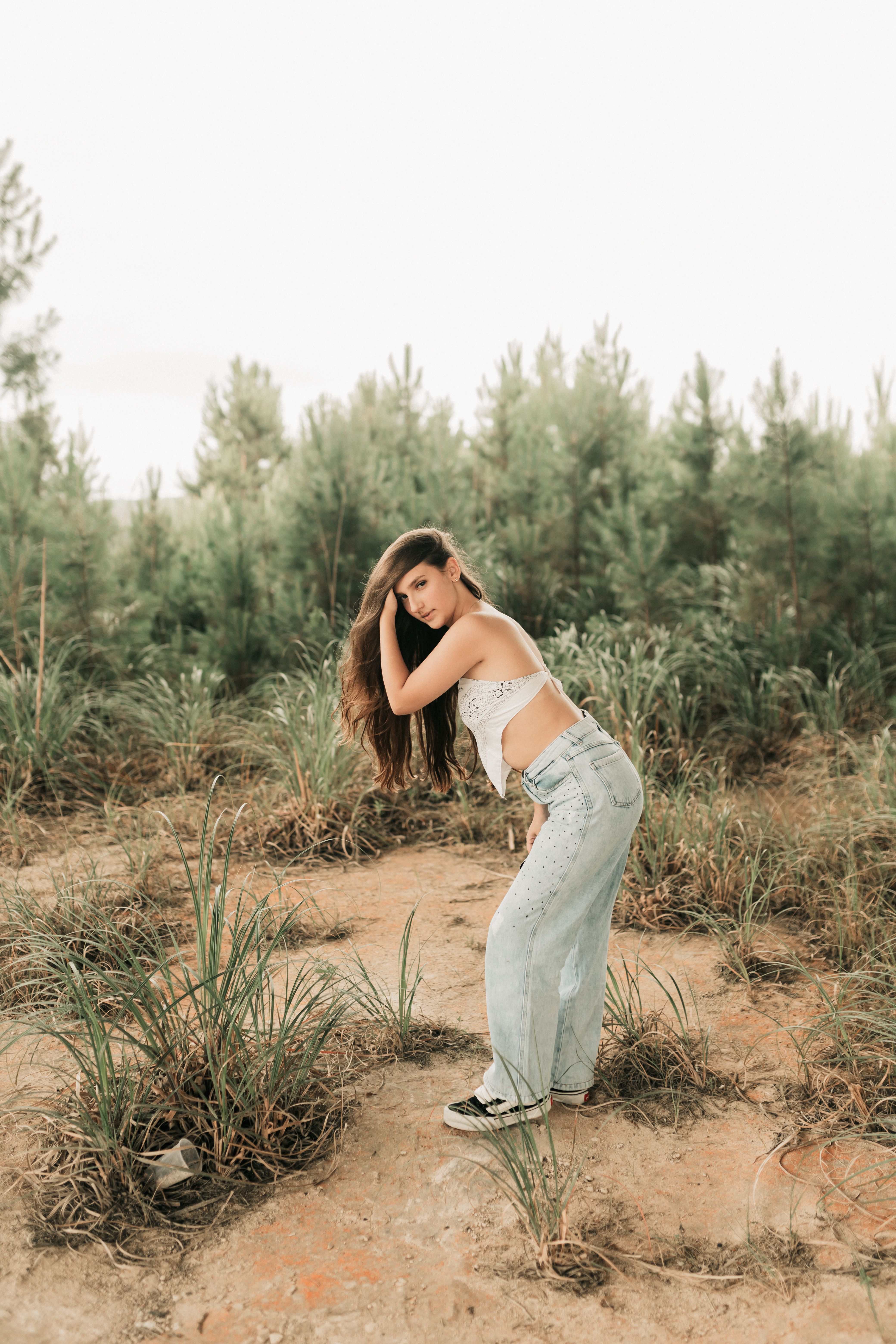 Young Woman Posing in a Natural Setting · Free Stock Photo