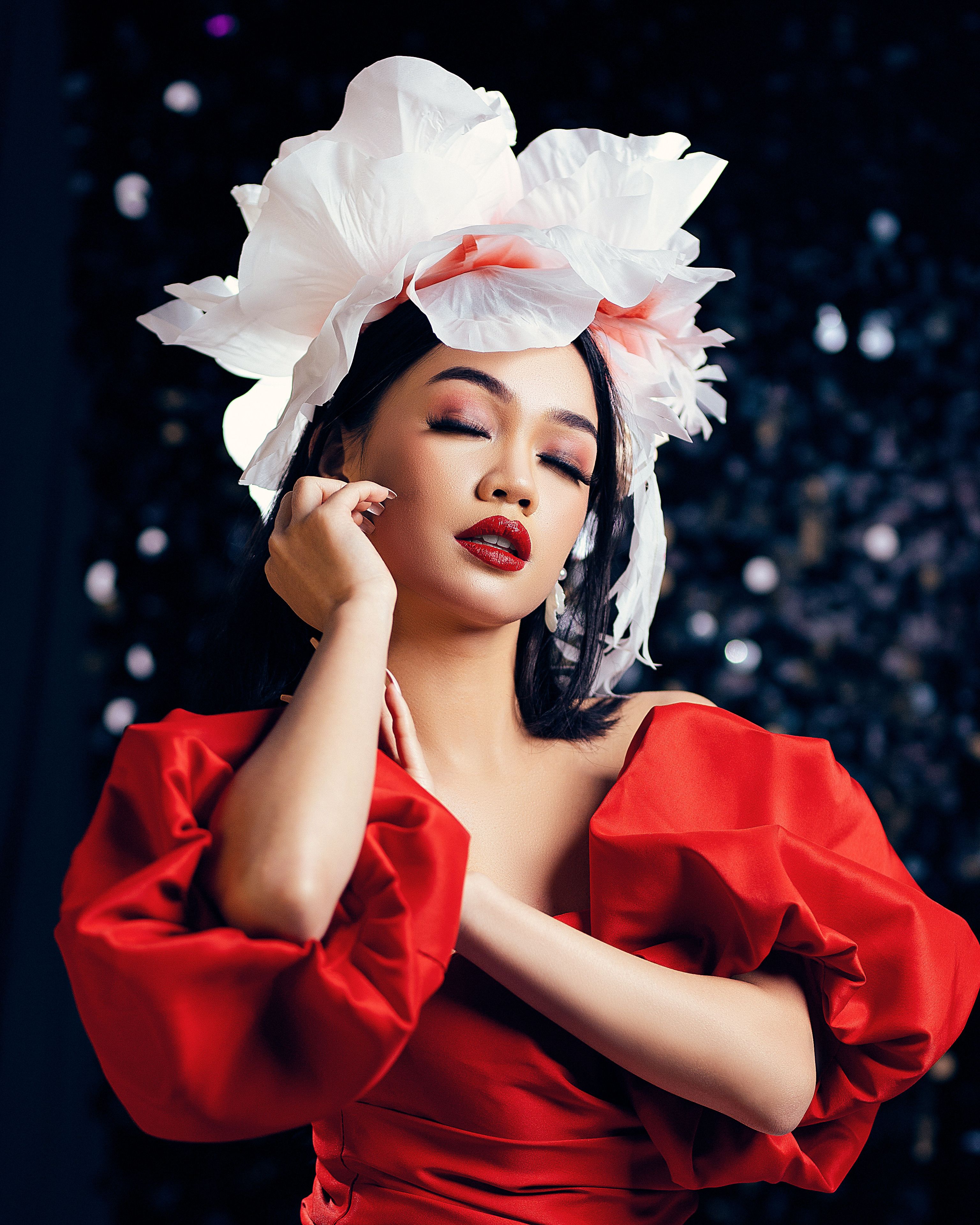 Elegant Woman with Floral Headpiece in Red Dress · Free Stock Photo