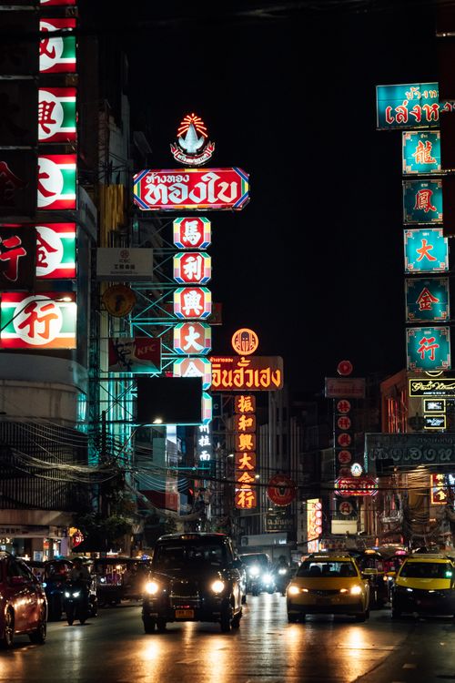 Free Explore the bustling nightlife and vibrant neon signs in Bangkok's Chinatown at night. Stock Photo