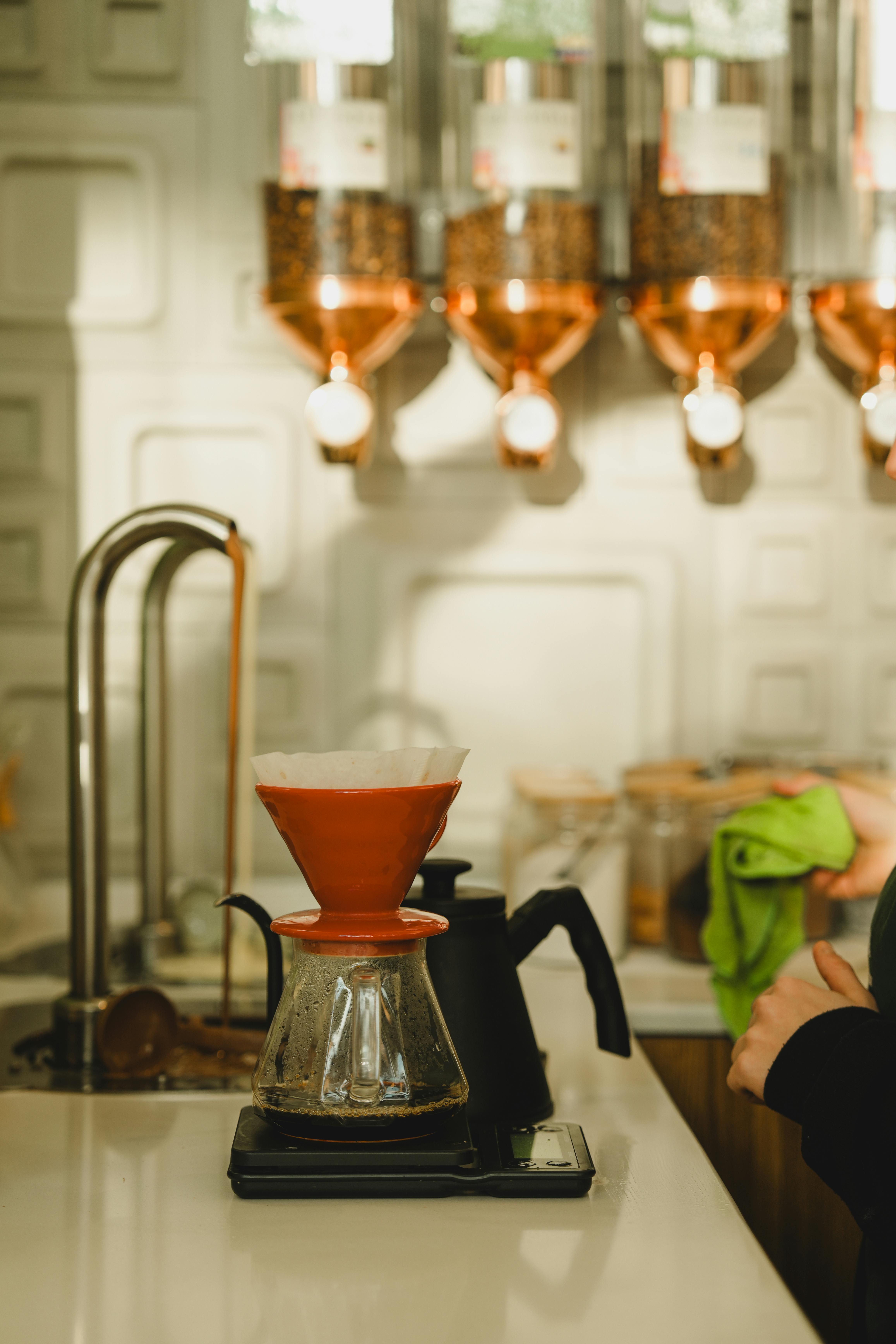 Pour Over Coffee Brewing in Cozy Caf\u00e9 Setting \u00b7 Free Stock Photo