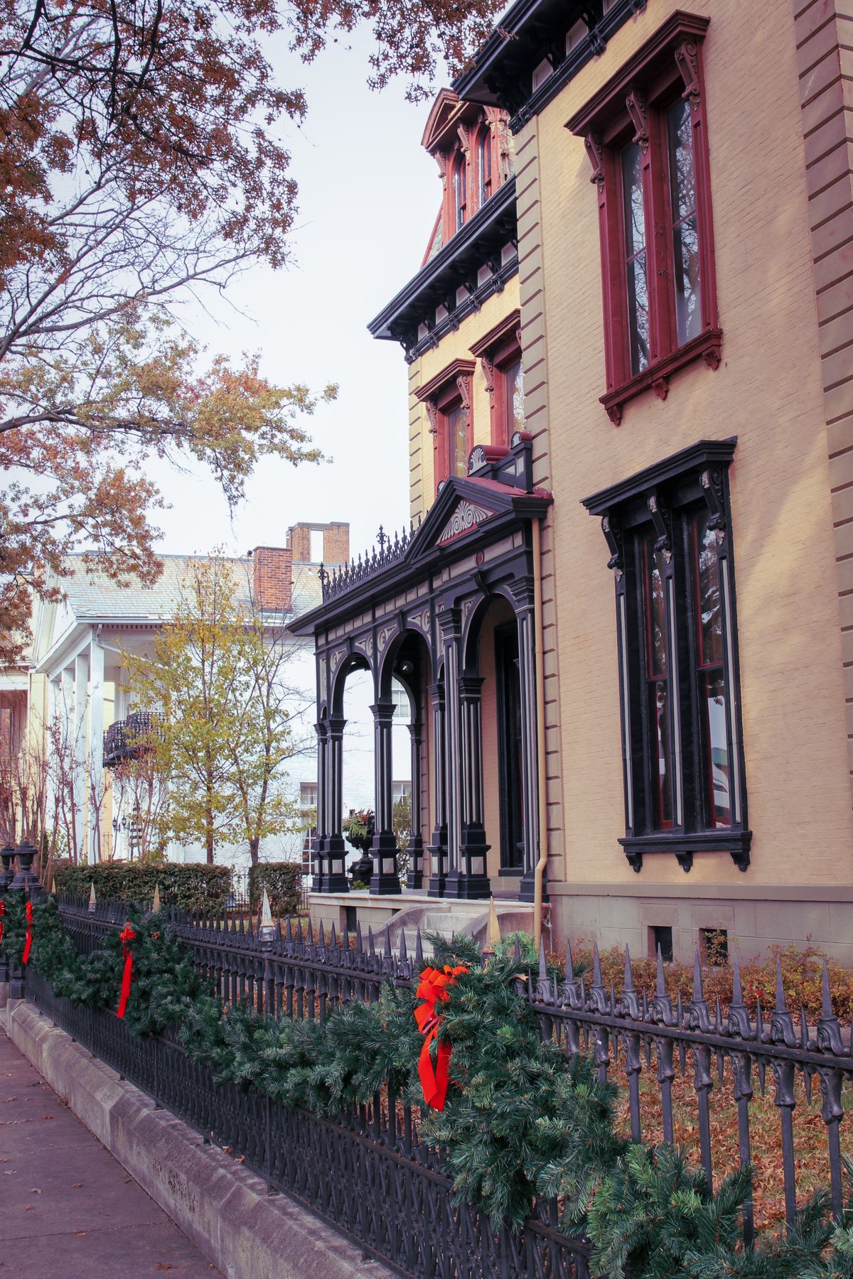 Victorian house exterior with festive Christmas garlands