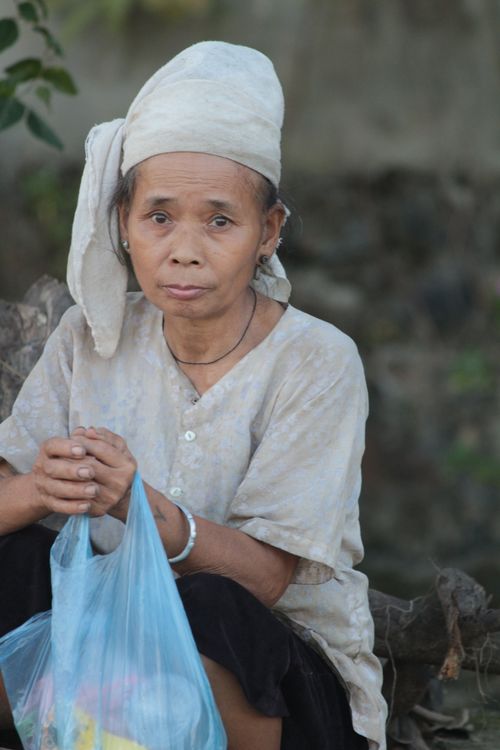 Free Portrait of an elderly woman in traditional attire in Yên Bái, Vietnam. Stock Photo