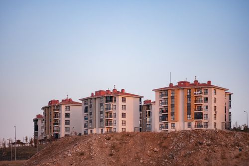 Free Contemporary apartment buildings on a hill in Elâzığ, Türkiye, captured during dusk. Stock Photo