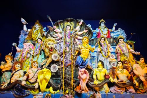 Free Vibrant depiction of Durga idols during Durga Puja festival in Kolkata, India. Stock Photo