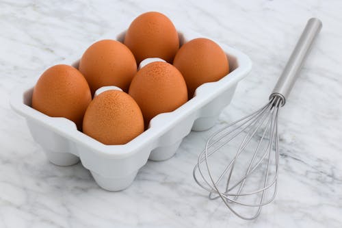 Free Six Brown Eggs With Tray Stock Photo