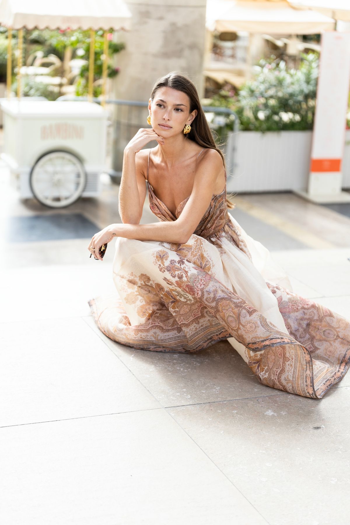 An elegant woman in a flowing dress outdoors — the boho maxi in its natural setting