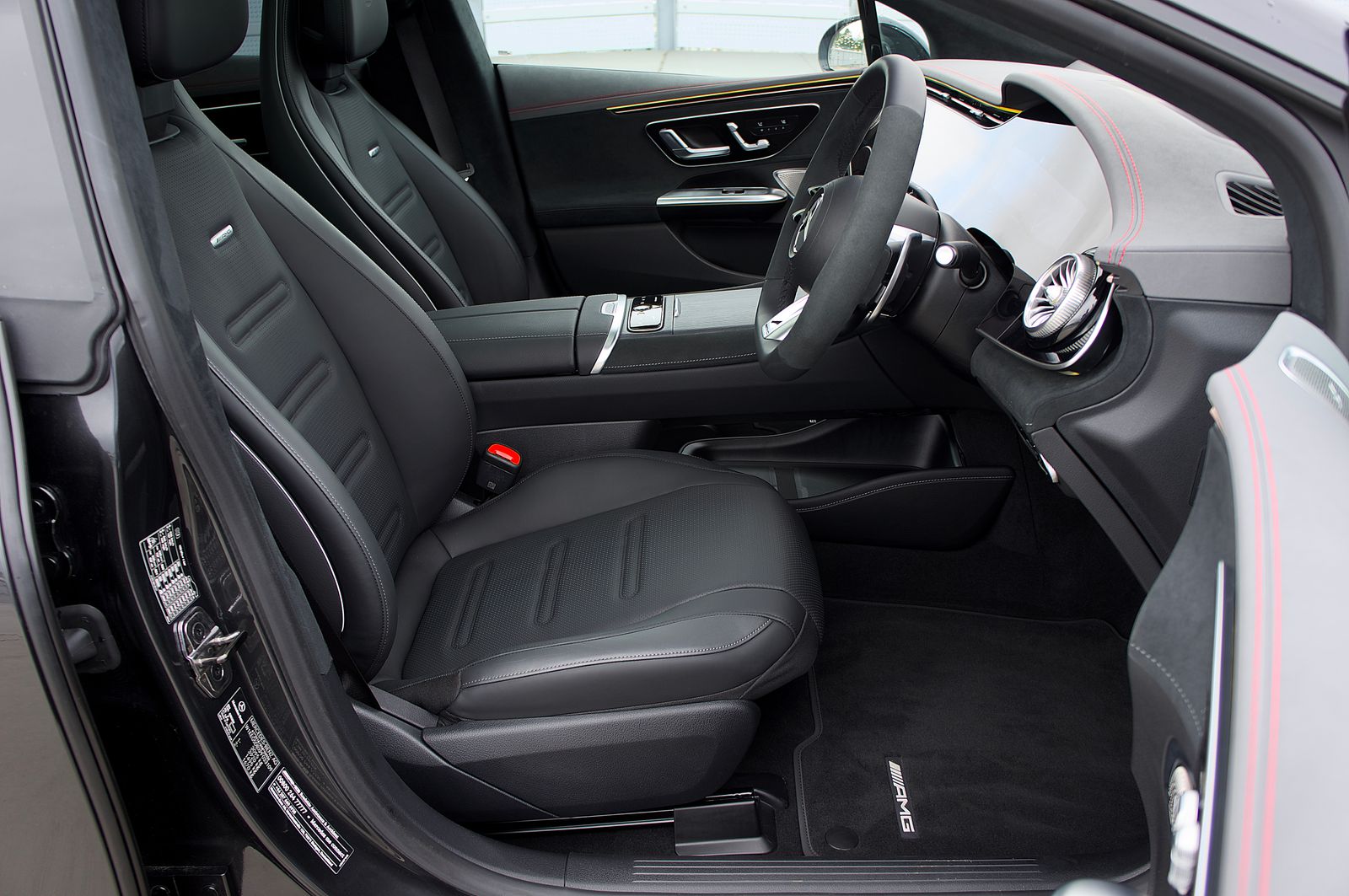 Luxury vehicle interior with leather seating and modern dashboard