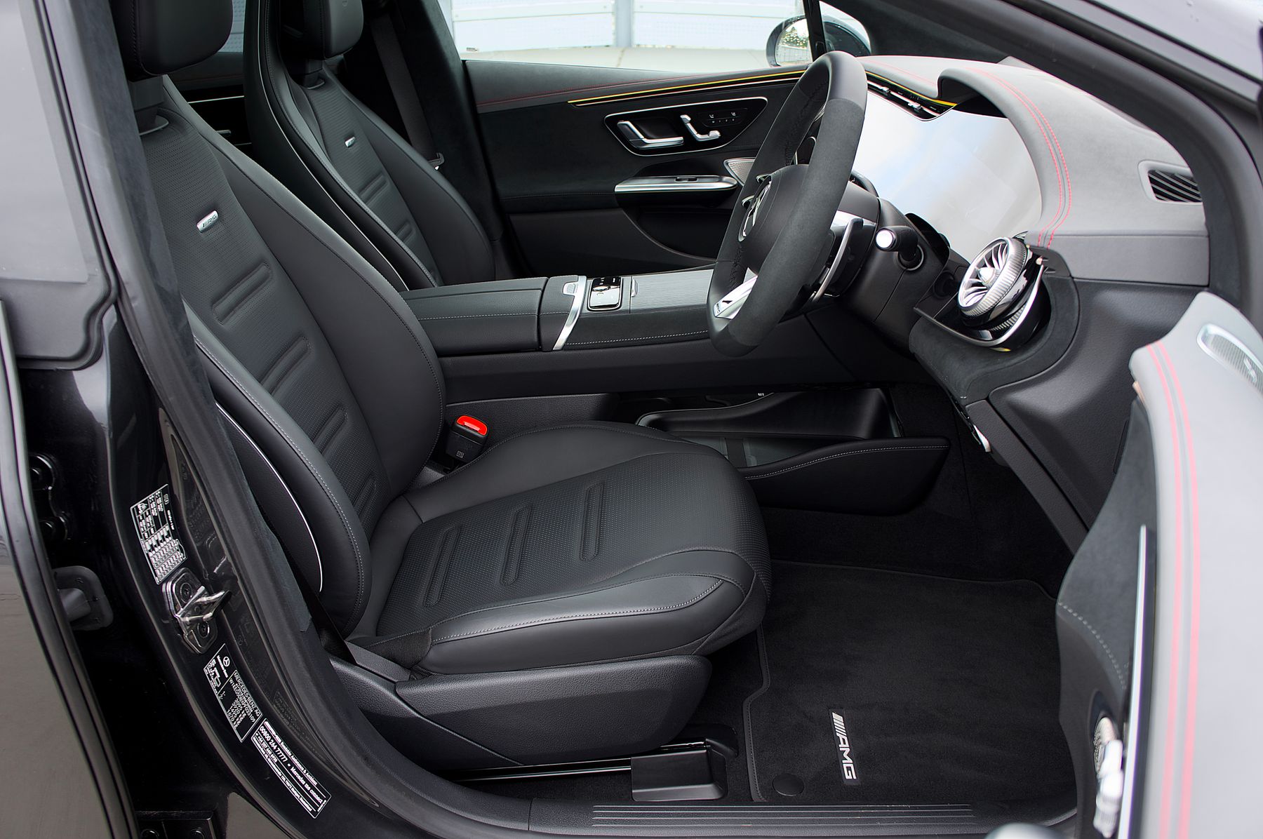 Luxury vehicle cabin with leather seats and an organized dashboard