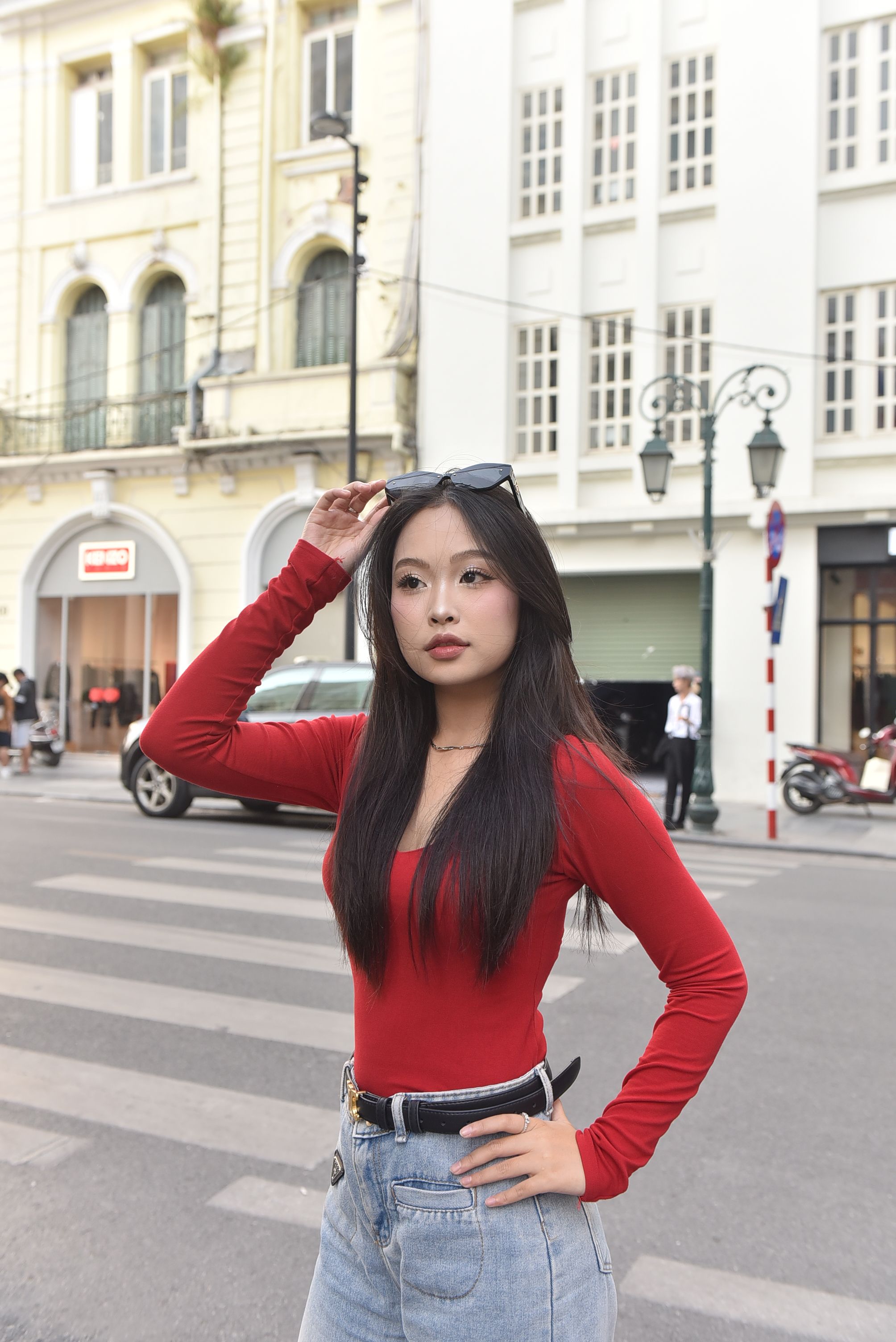 Young woman posing in urban street setting · Free Stock Photo