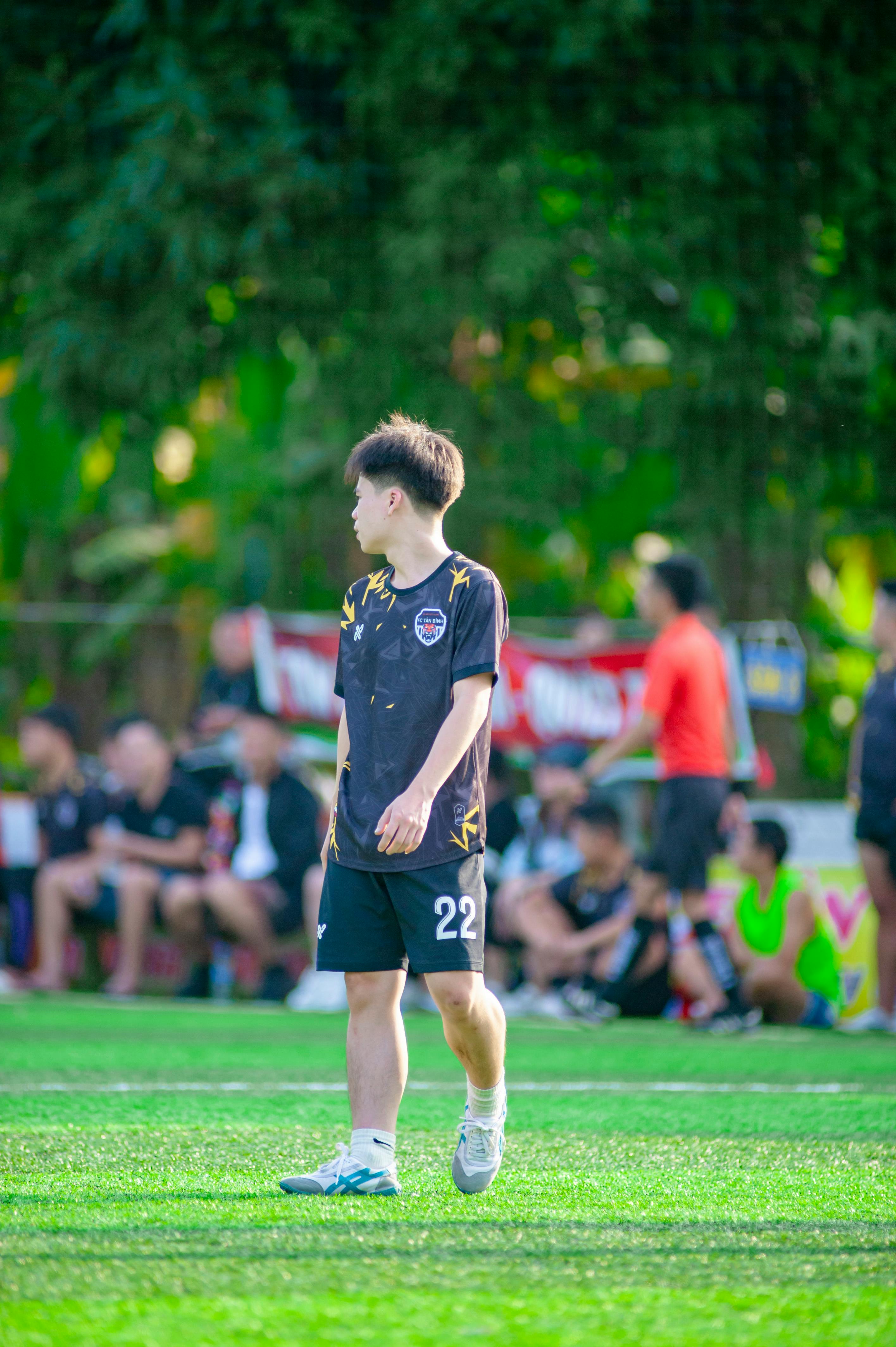 young soccer player on hanoi field