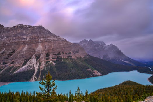 Capture of Peyto Lake at sunrise in Banff National Park, showcasing the beauty of the Canadian Rockies.
