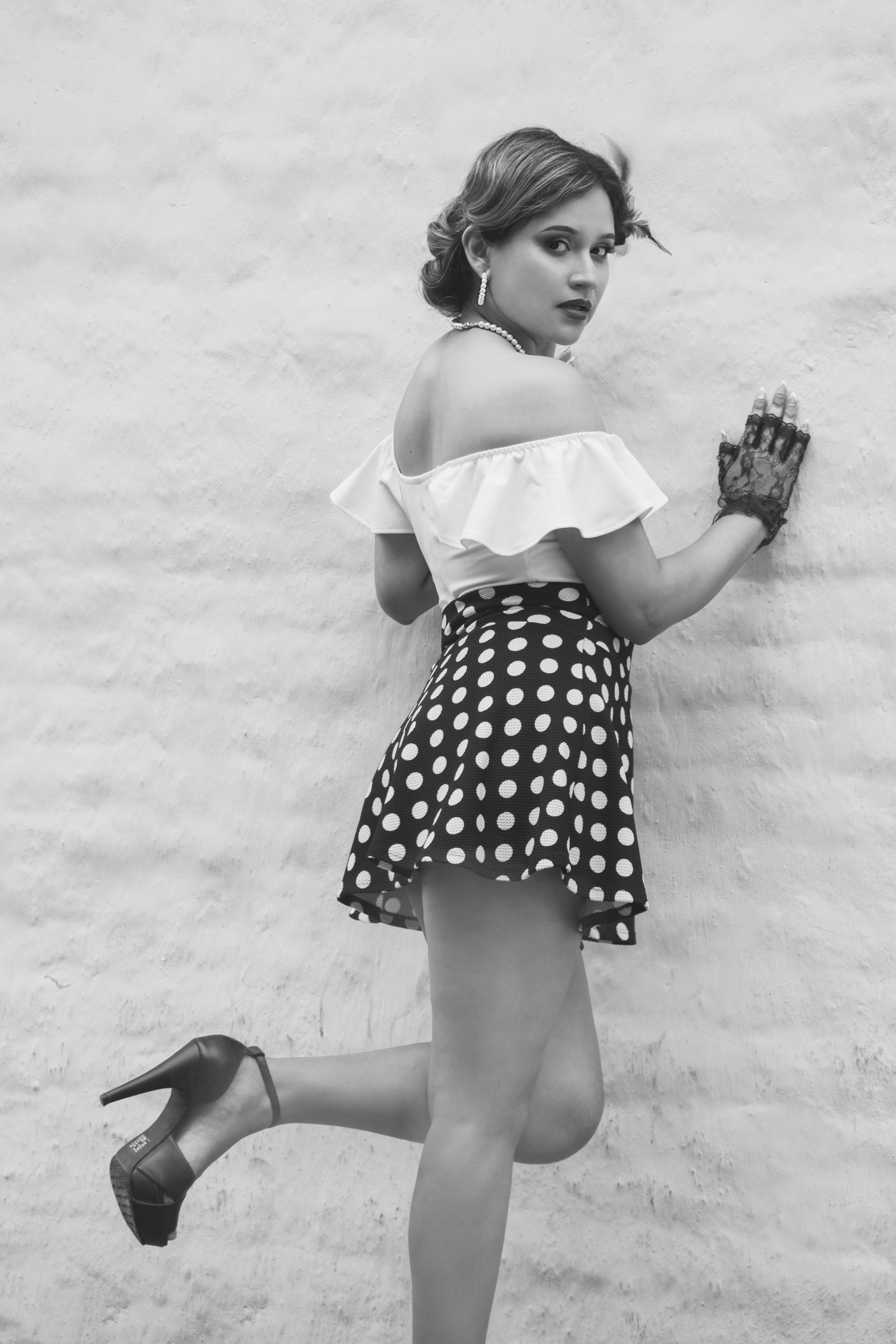 Stylish Woman Posing in Vintage Attire · Free Stock Photo