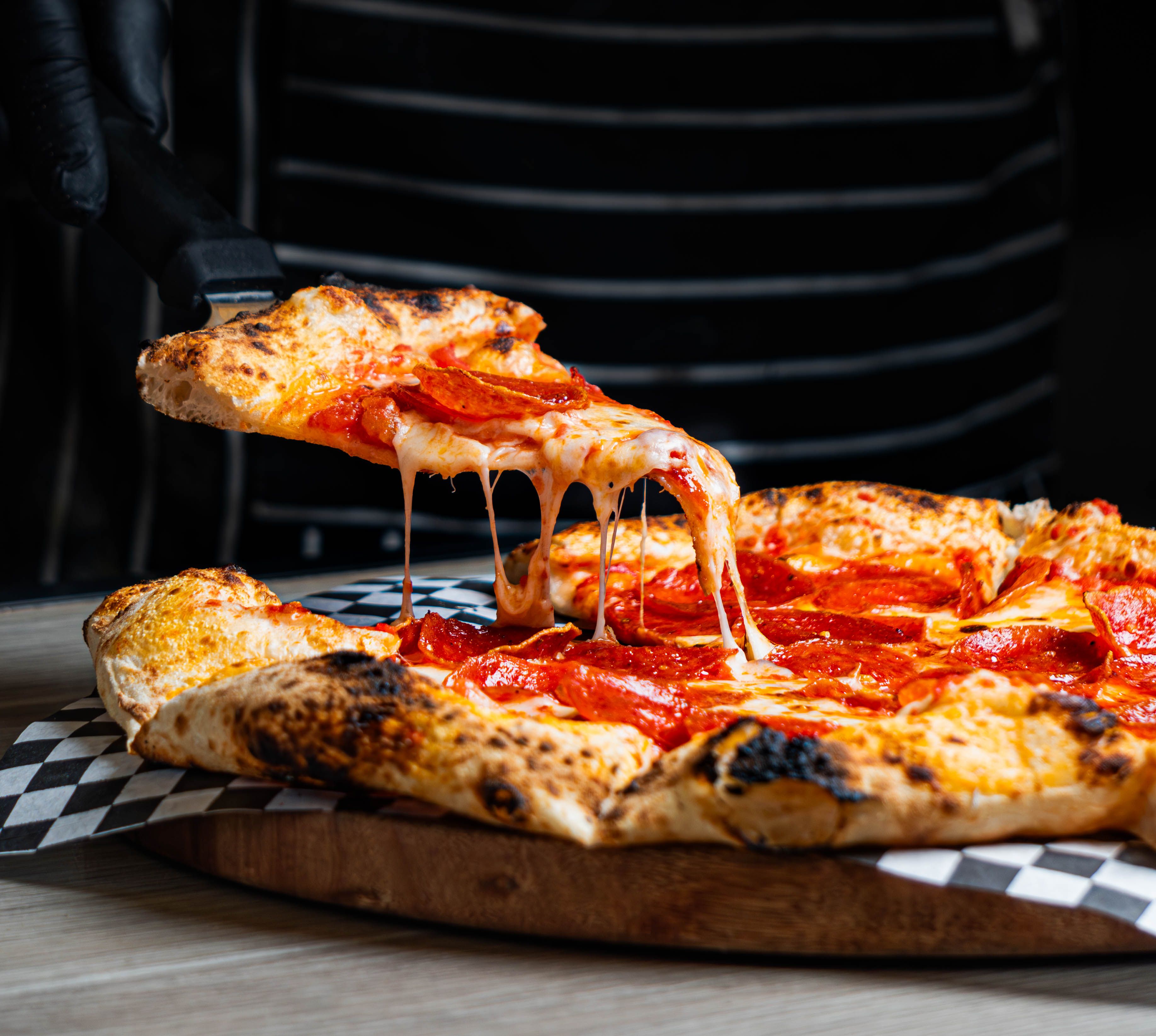 sliced-pepperoni-pizza-in-close-up-view-free-stock-photo