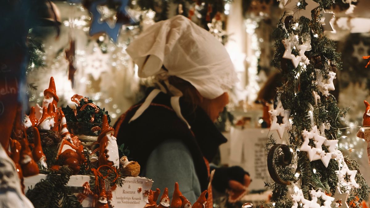 Wooden Christmas market stall decorated with lights in Berlin