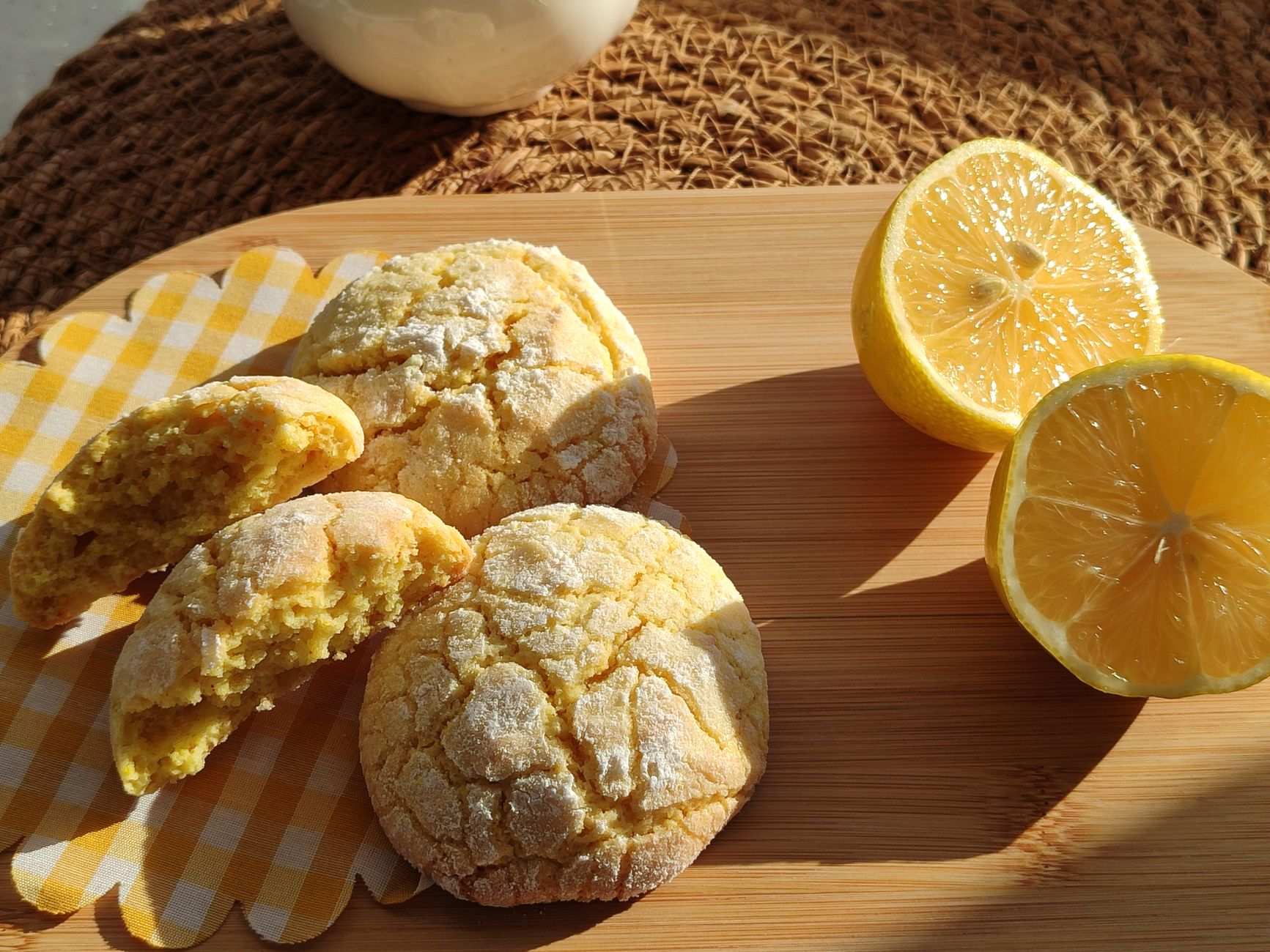 Lemon zest being grated over baked goods