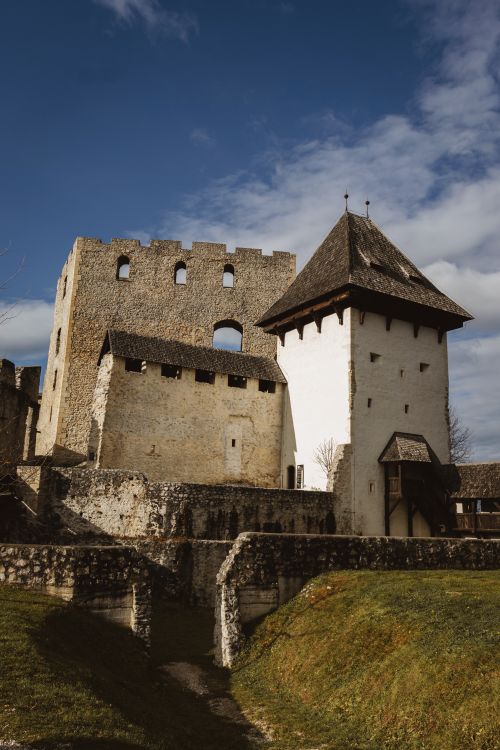 Free A view of the Celje Castle in Slovenia, showcasing medieval architecture against a clear sky. Stock Photo