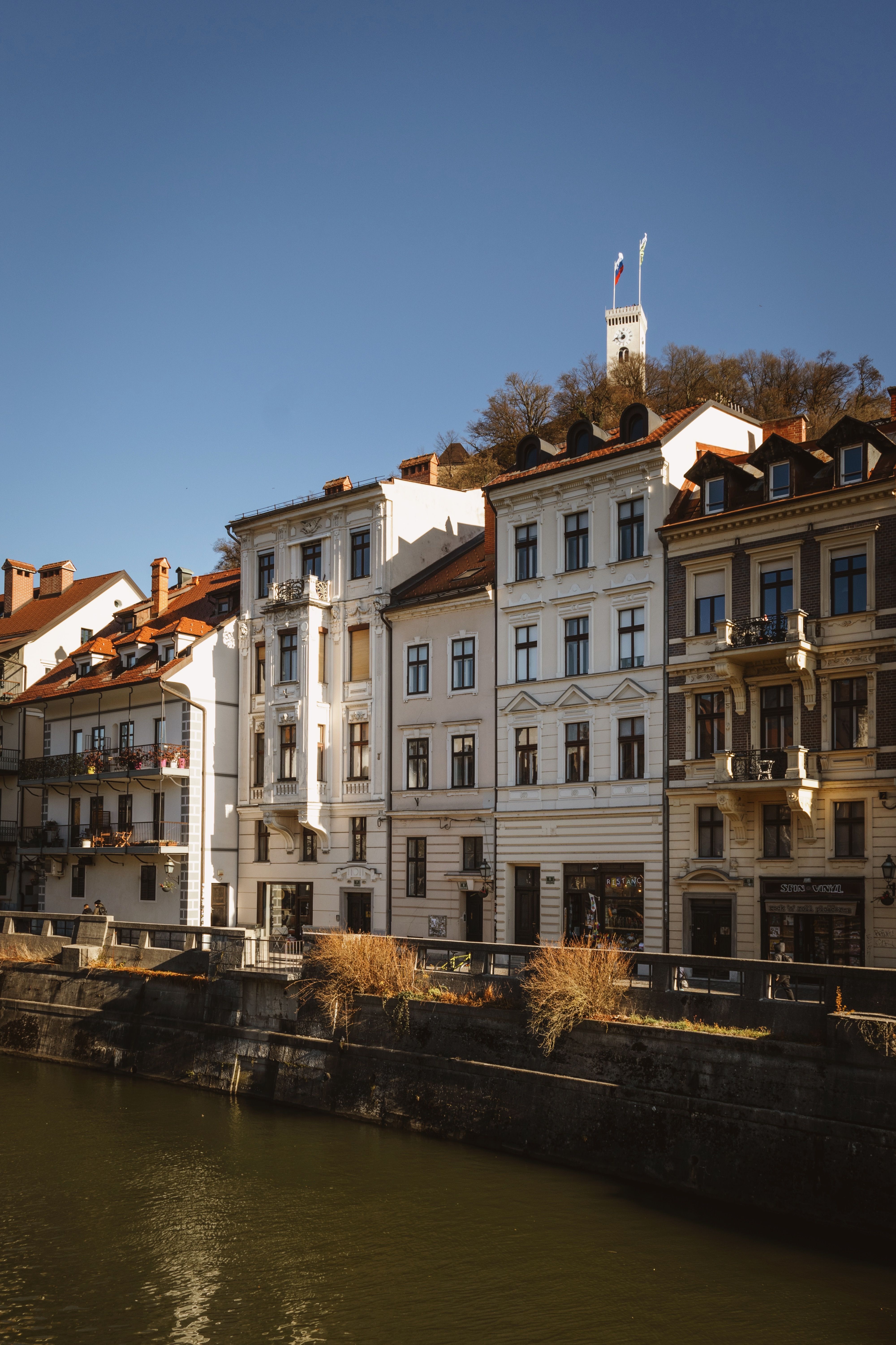 Historic riverside buildings lining the Ljubljanica River in Ljubljana, Slovenia