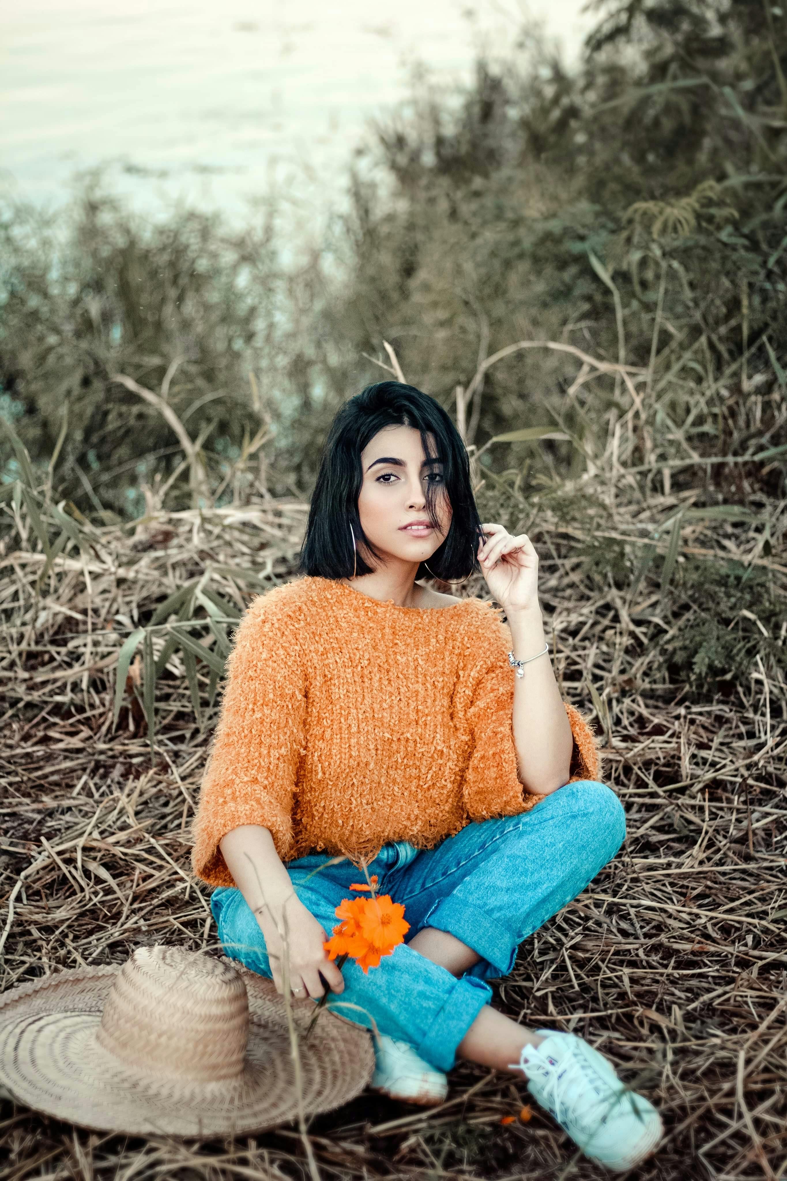 Photo Of Woman Sitting On Ground \u00b7 Free Stock Photo