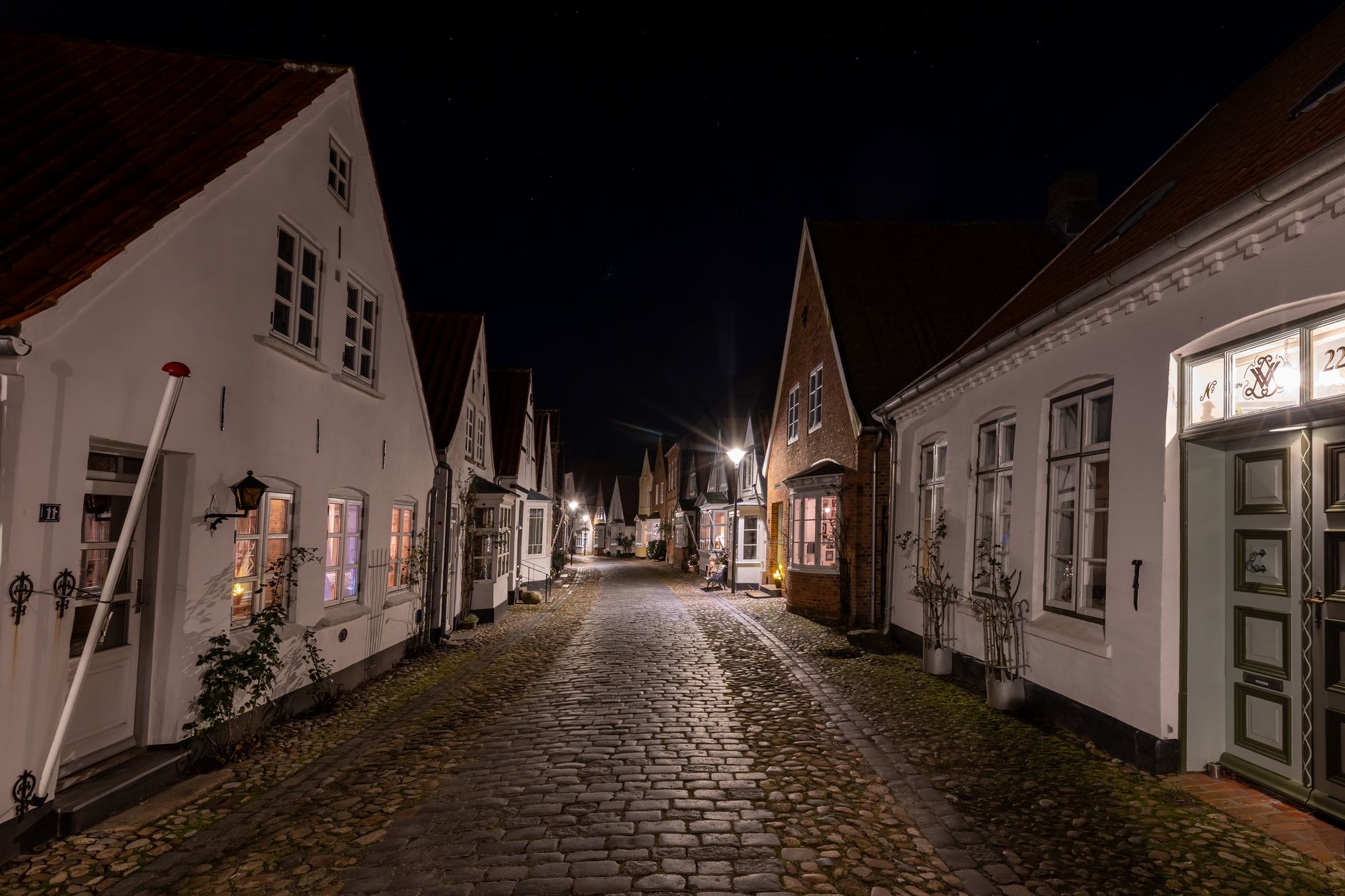 ribe denmark night watchman medieval street lantern costumed evening walk historic