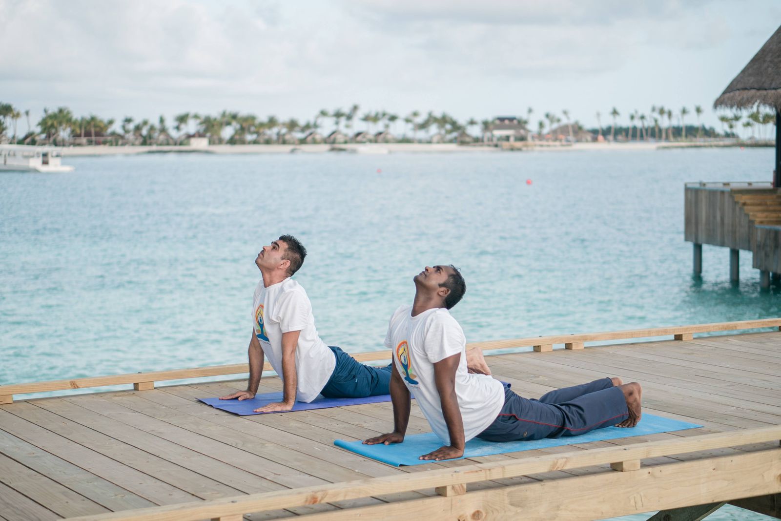 Yoga on a deck above the ocean