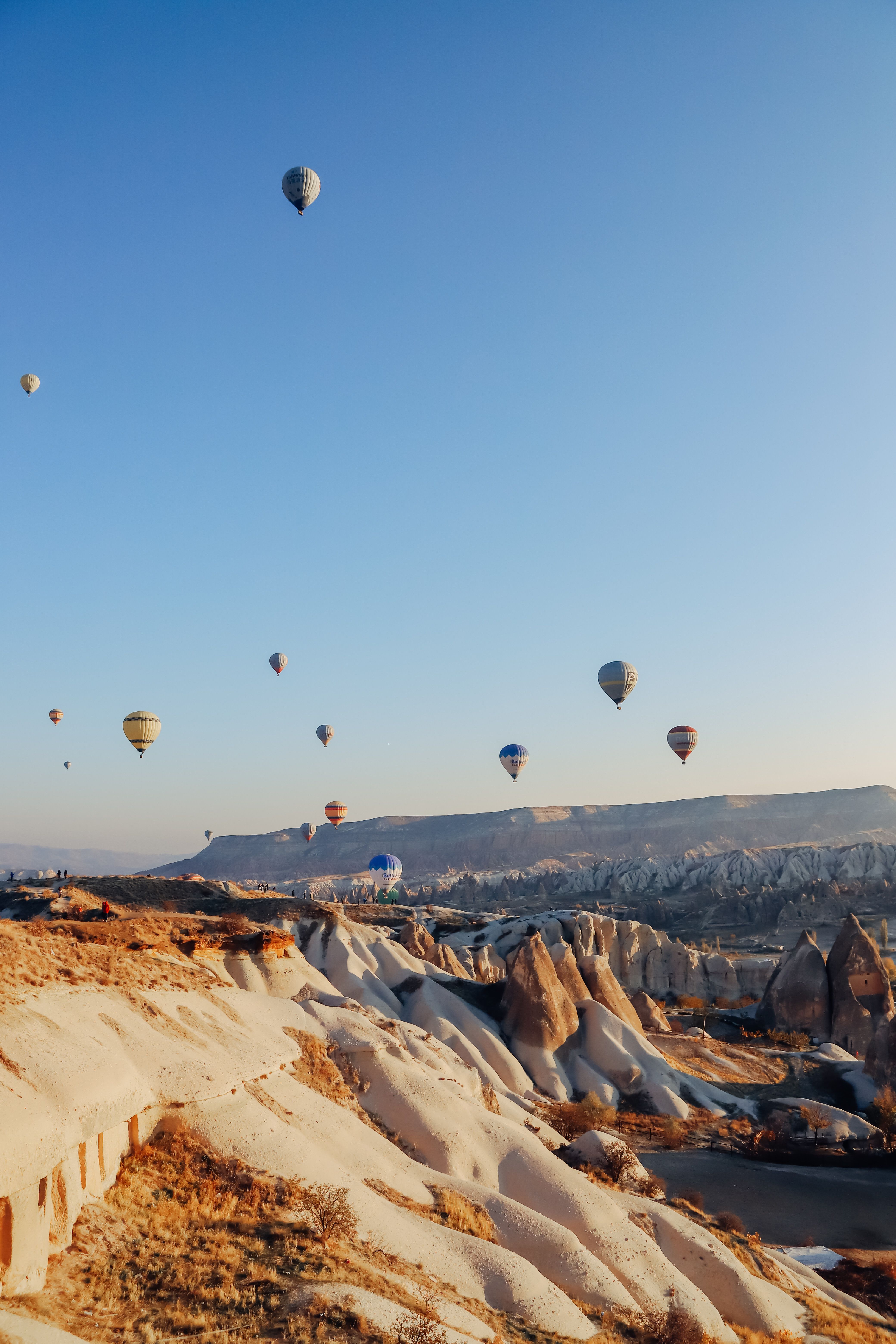 Hot Air Balloons Over Cappadocia at Sunrise · Free Stock Photo