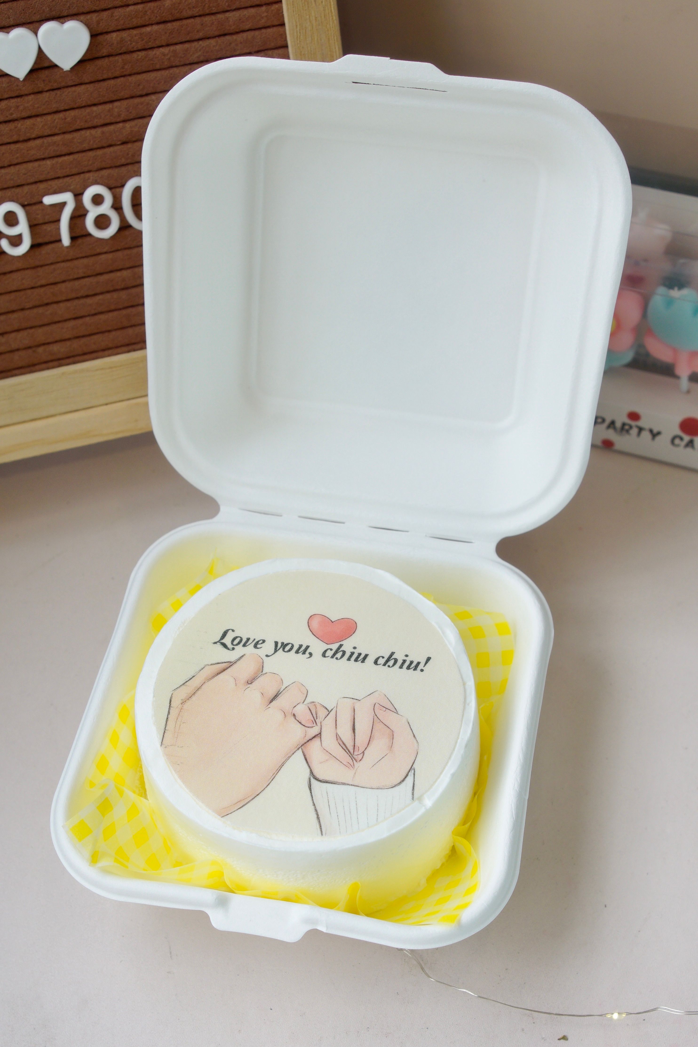 A cake boxed and ready for delivery