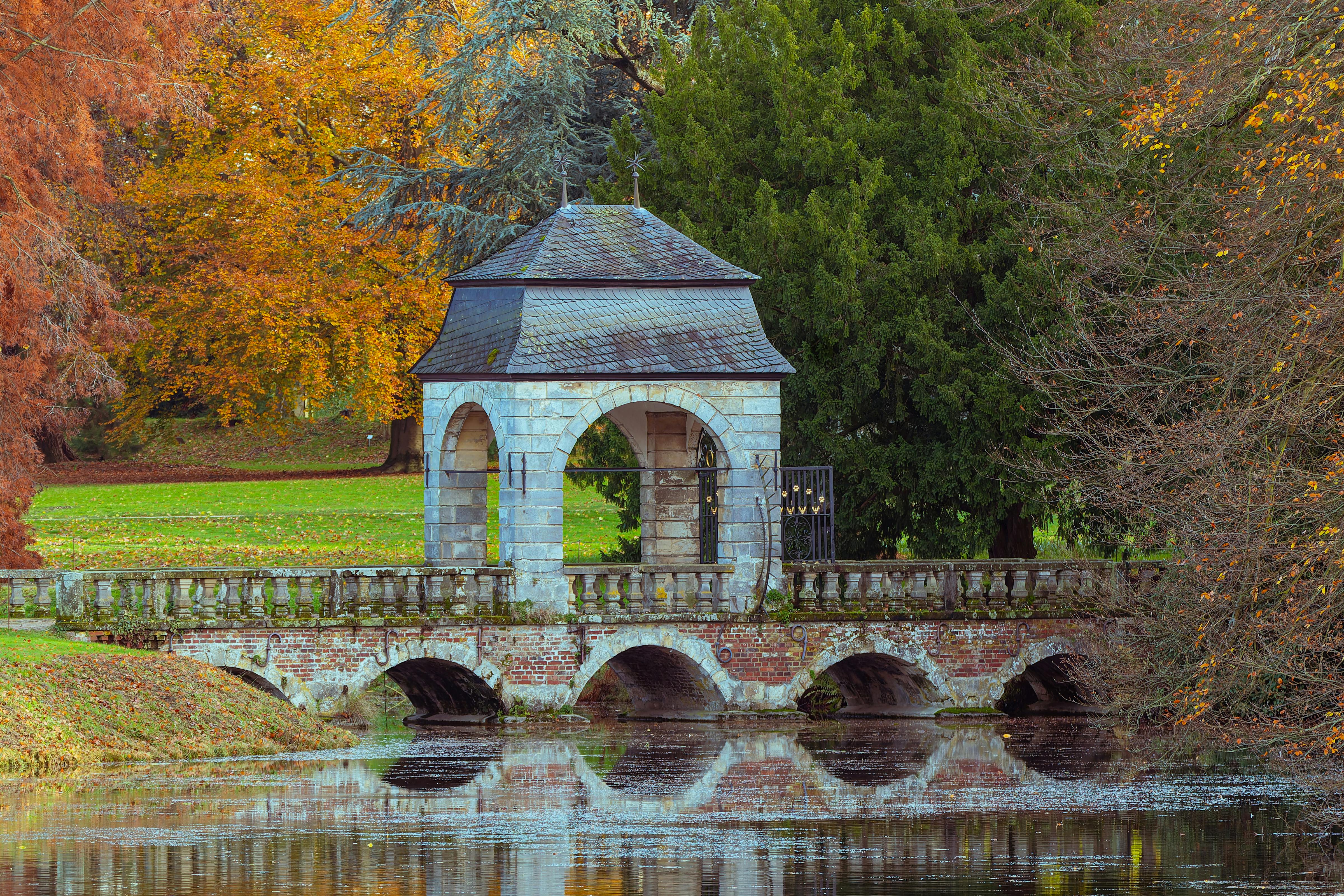 charming stone pavilion in autumn park