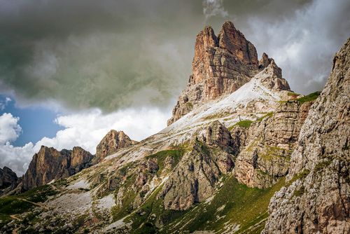 Free Explore the rugged beauty of a towering peak in the Dolomites with stunning rock formations. Stock Photo