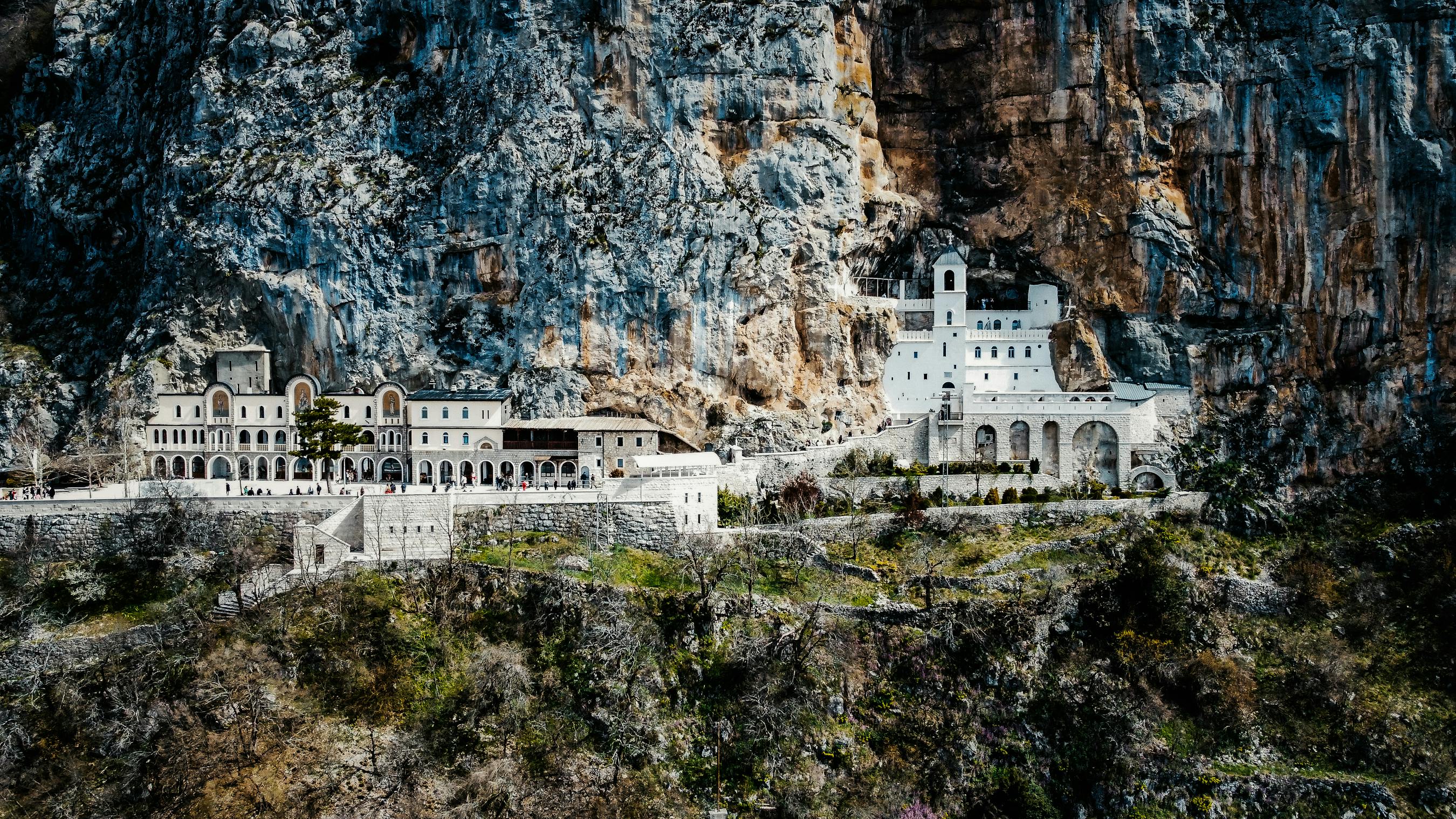 Ostrog Monastery against Montenegro Cliffs · Free Stock Photo, image size:1260x709