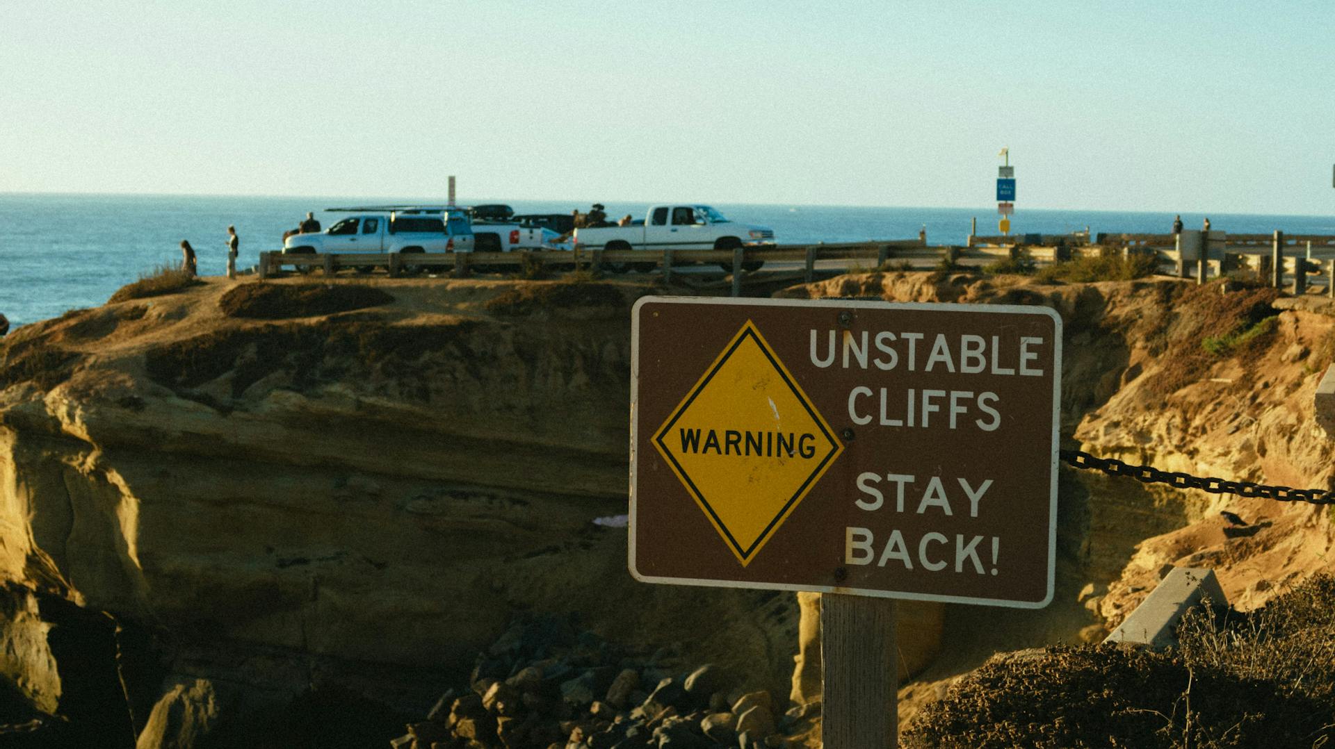 Warning Unstable Cliffs Stay Back Road Signage