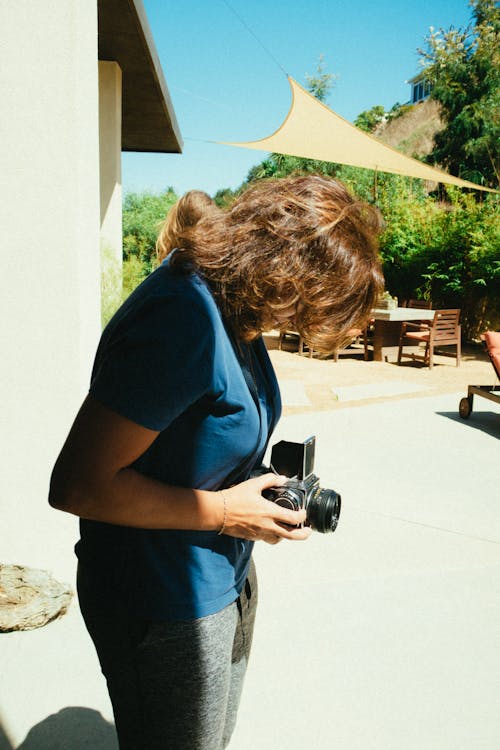 Person Holding A Camera