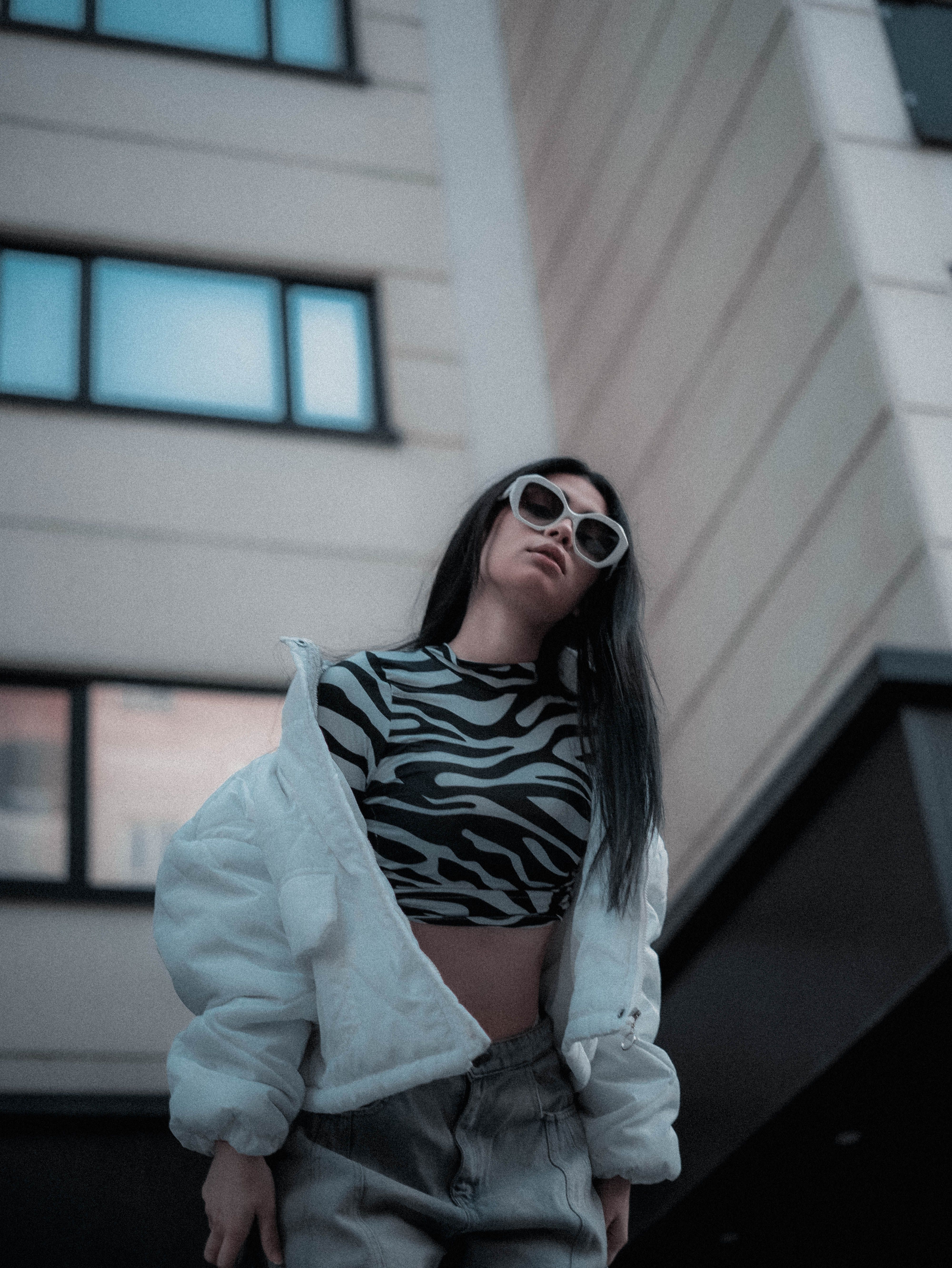 Stylish Young Woman in Urban Setting · Free Stock Photo