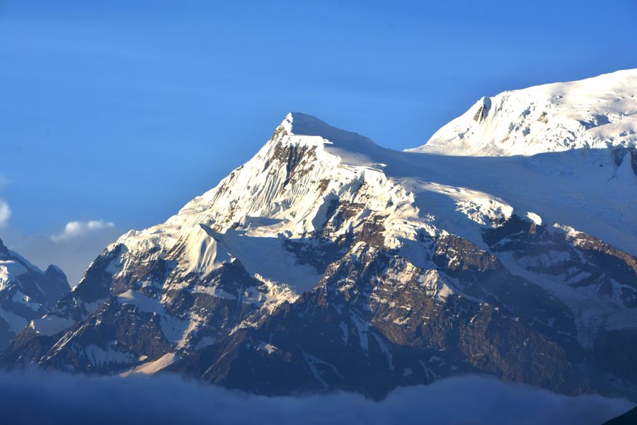 Snow-capped Himalayan peaks at sunrise
