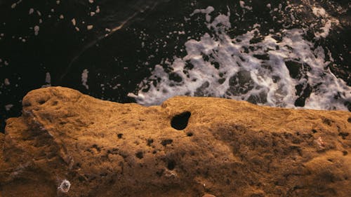 Close-up Photo of Brown Rocky Cliff