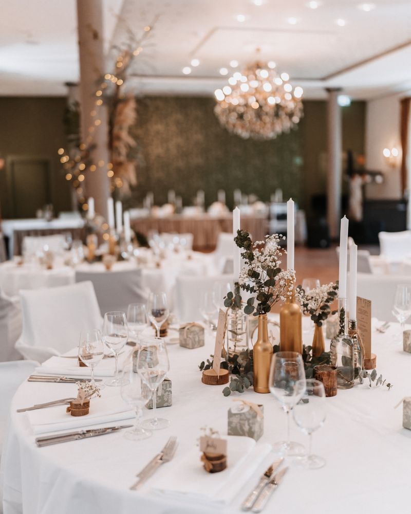 Chic wedding reception with elegant table decorations and ambient lighting