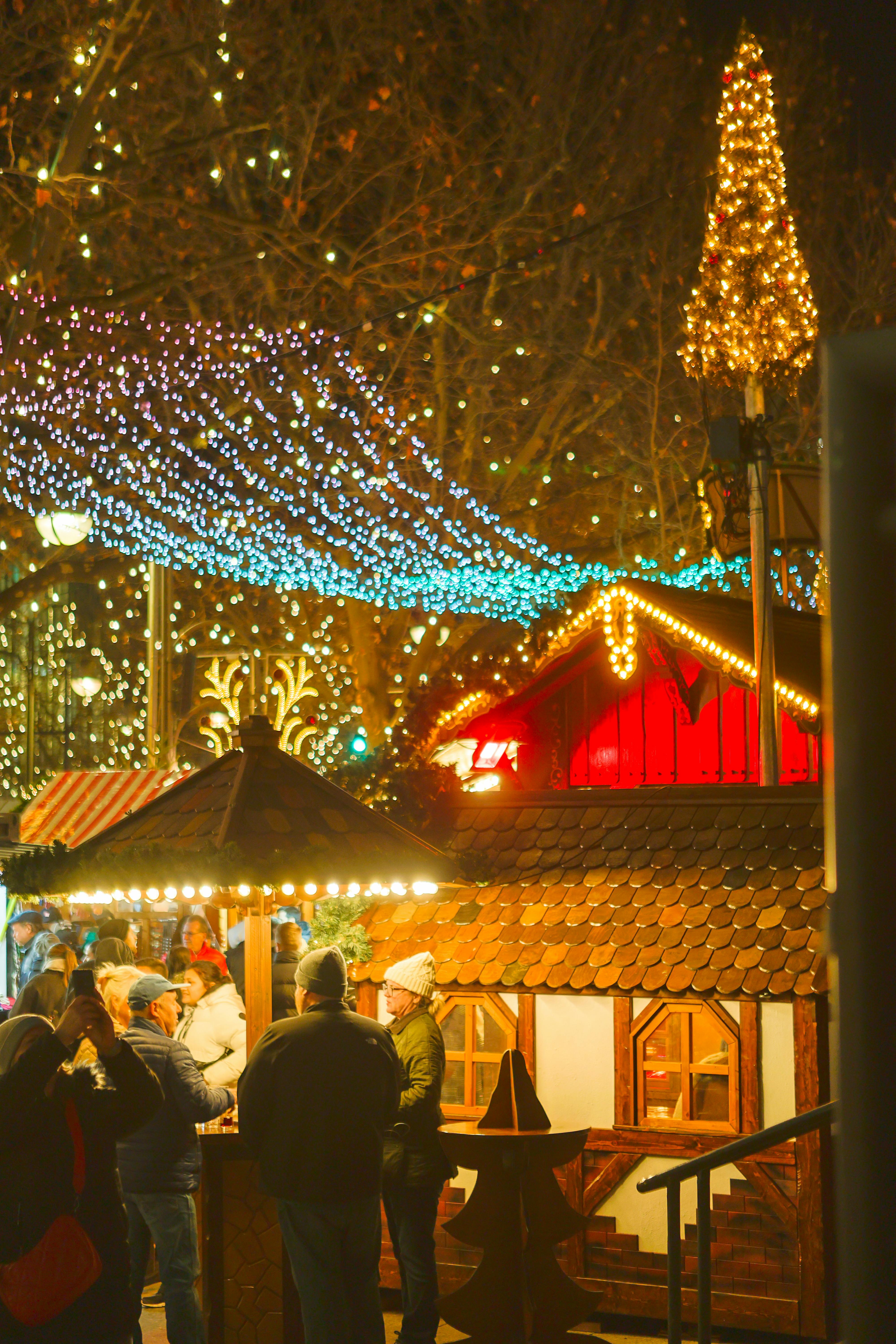 vibrant berlin christmas market scene at night