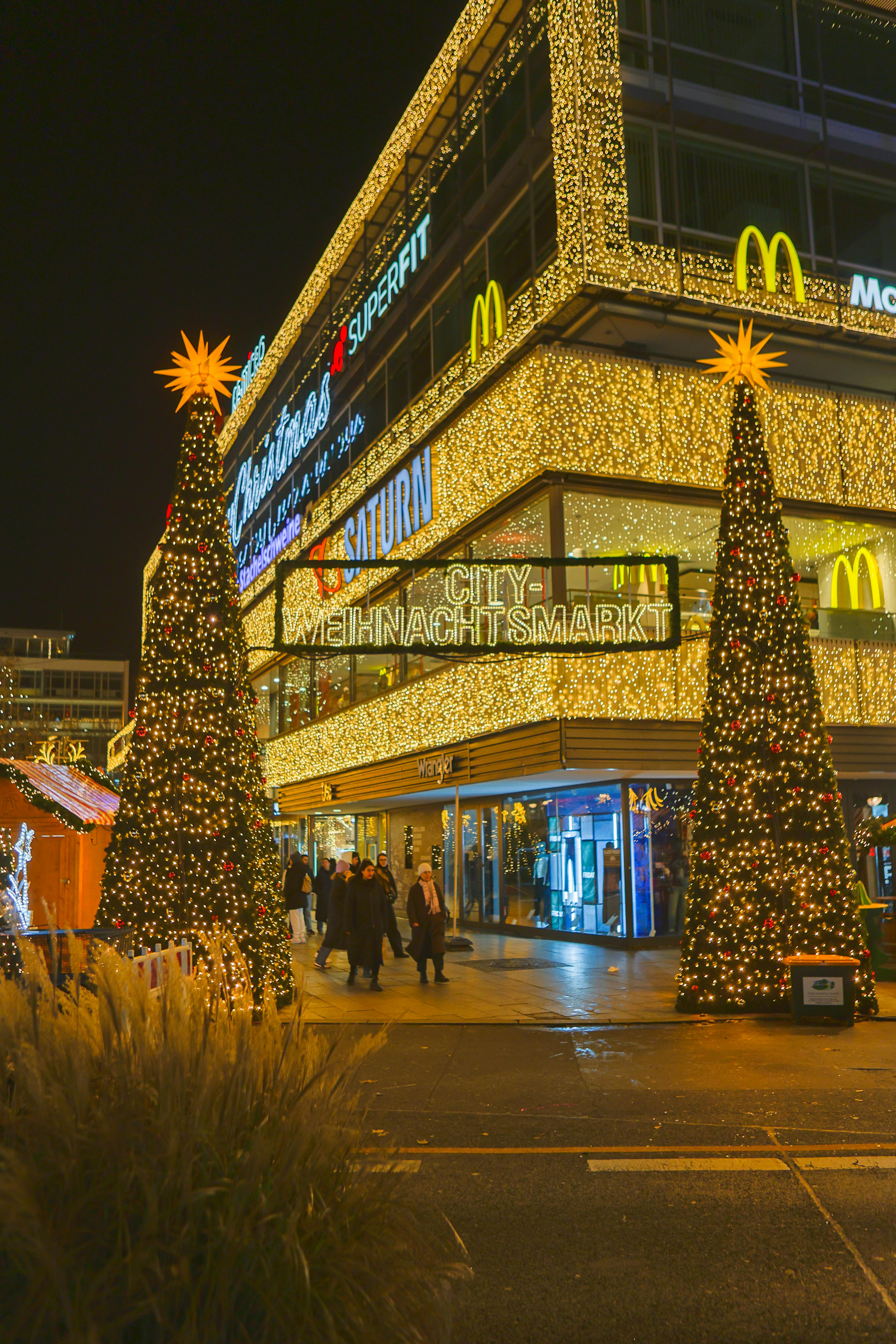 festive christmas market in berlin at night